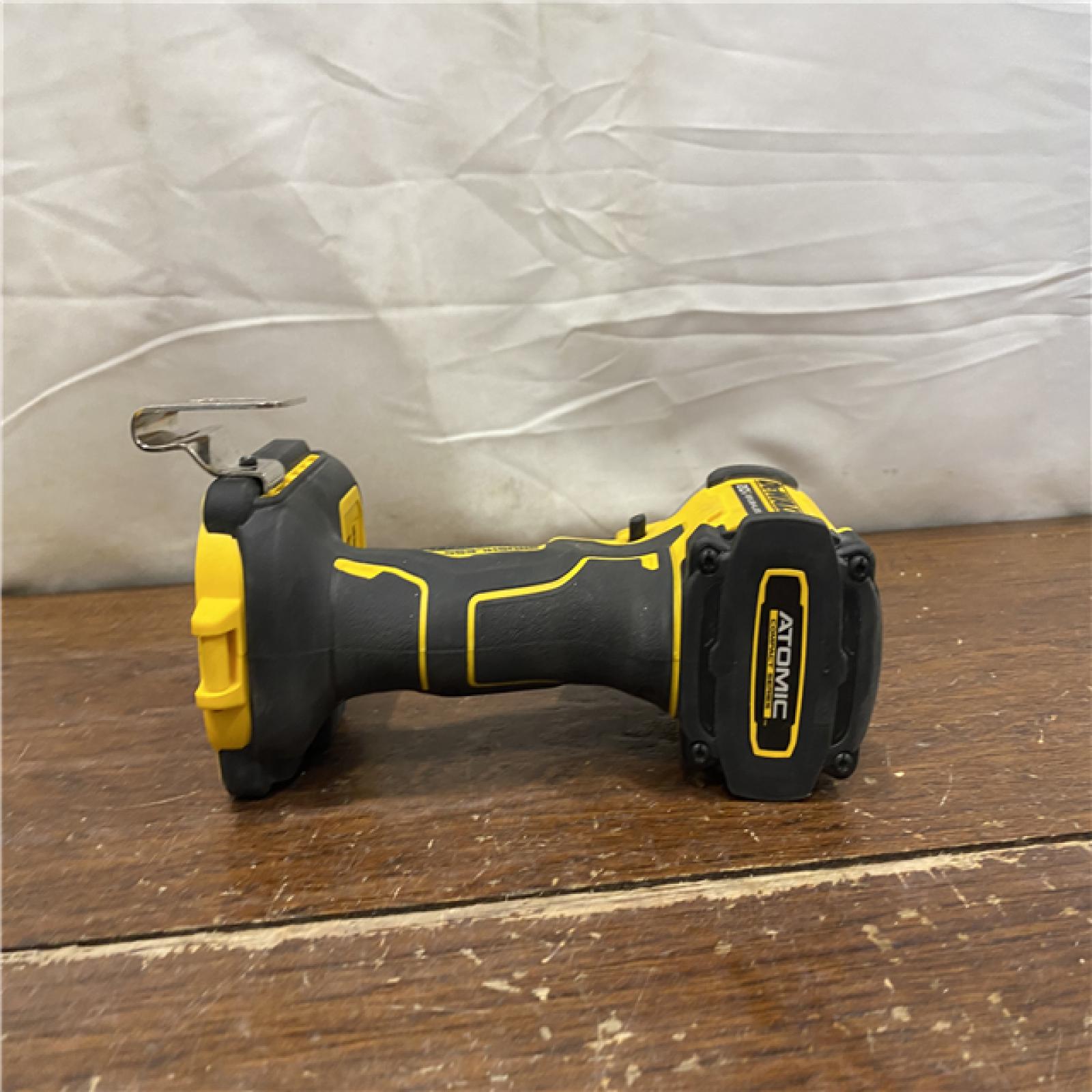 AS-IS DEWALT ATOMIC 20V MAX Lithium-Ion Cordless 1/4 in. Brushless Impact Driver Kit, 5 Ah Battery, Charger, and Bag