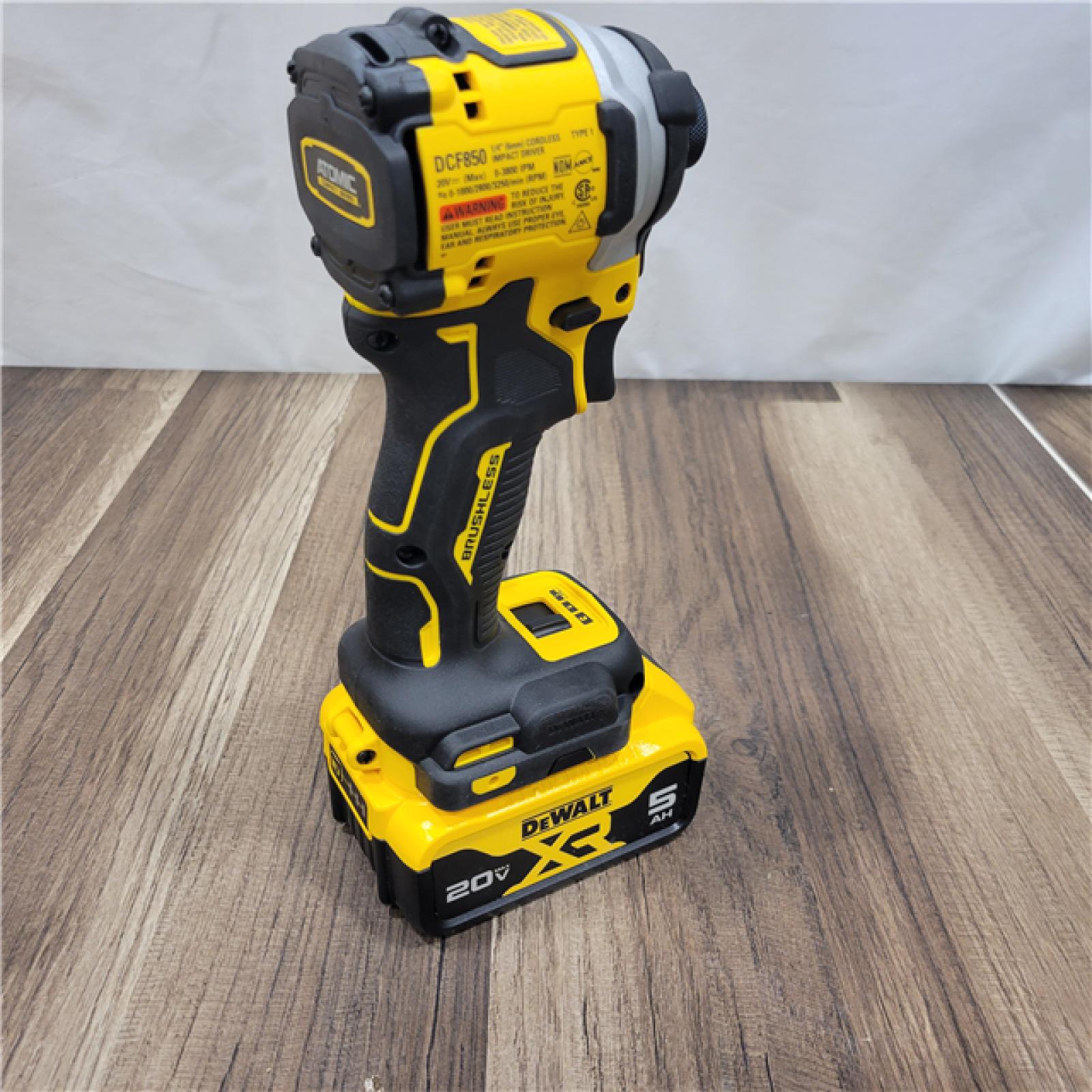 AS-IS DEWALT ATOMIC 20V MAX Lithium-Ion Cordless 1/4 in. Brushless Impact Driver Kit, 5 Ah Battery, Charger, and Bag