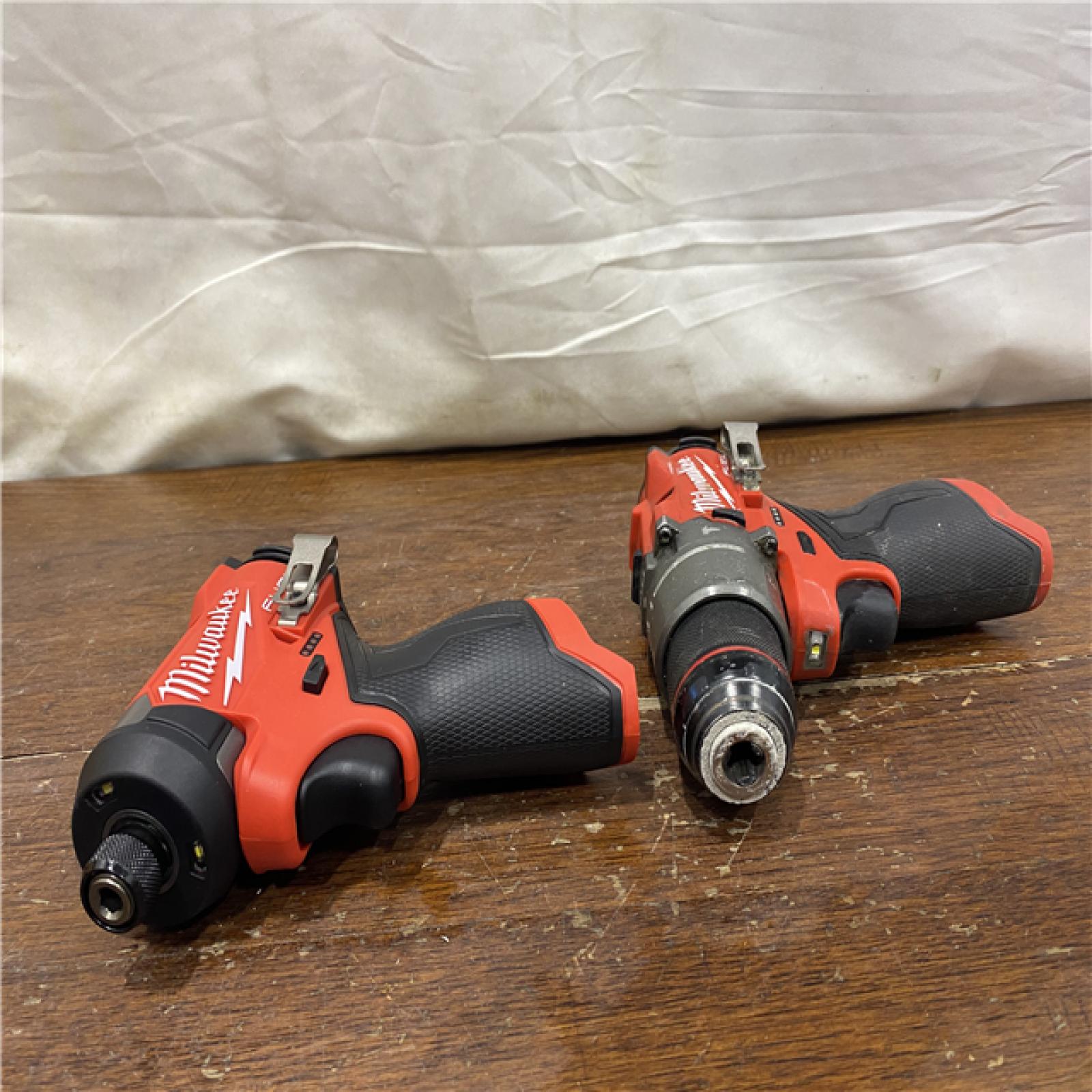 AS-IS MILWAUKEE M18 FUEL 18V Lithium-Ion Brushless Cordless Hammer Drill and Impact Driver Combo Kit (2-Tool) with 2 Batteries