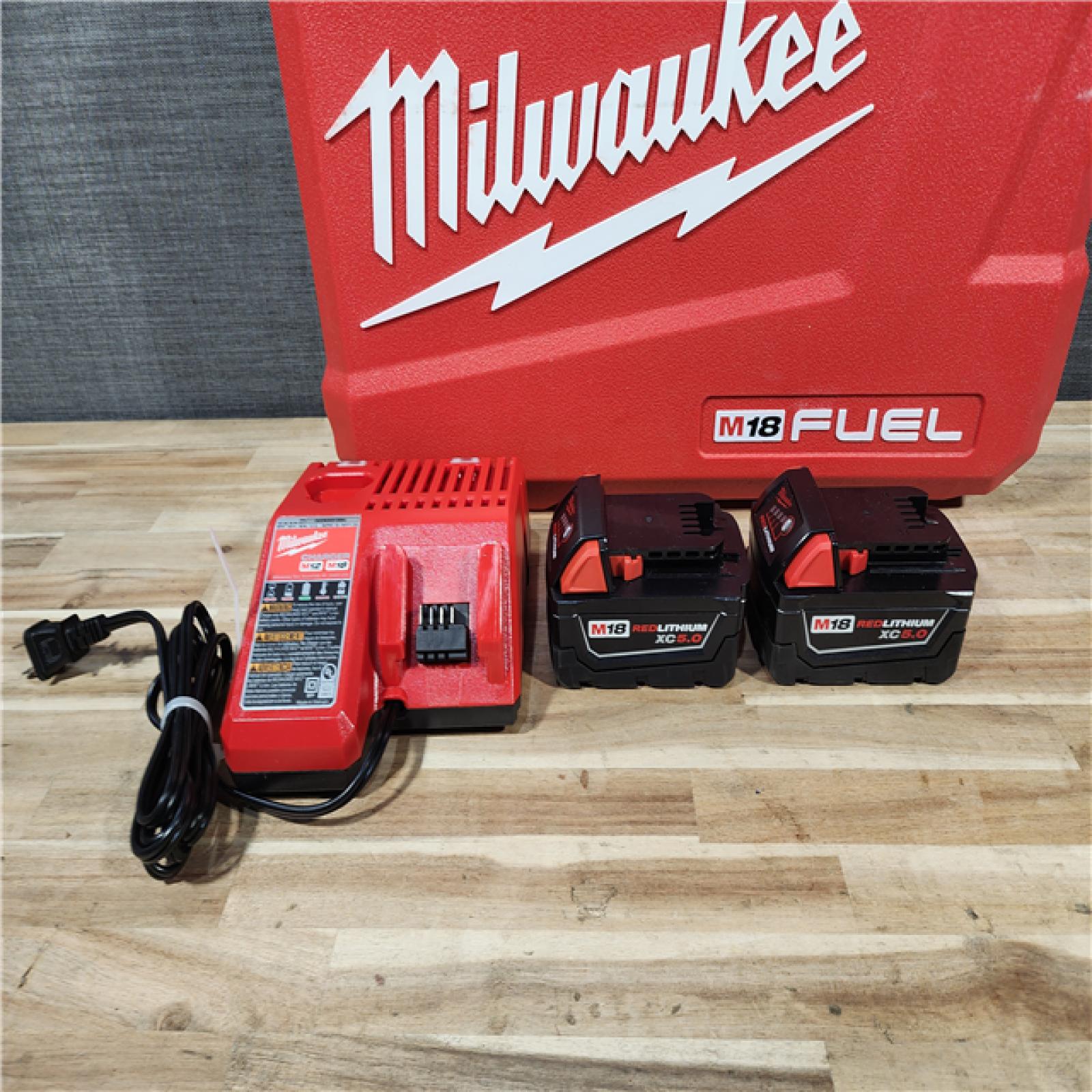 HOUSTON LOCATION - AS-IS Milwaukee FUEL 12-Volt Lithium-Ion Brushless Cordless Hammer Drill and Impact Driver Combo Kit