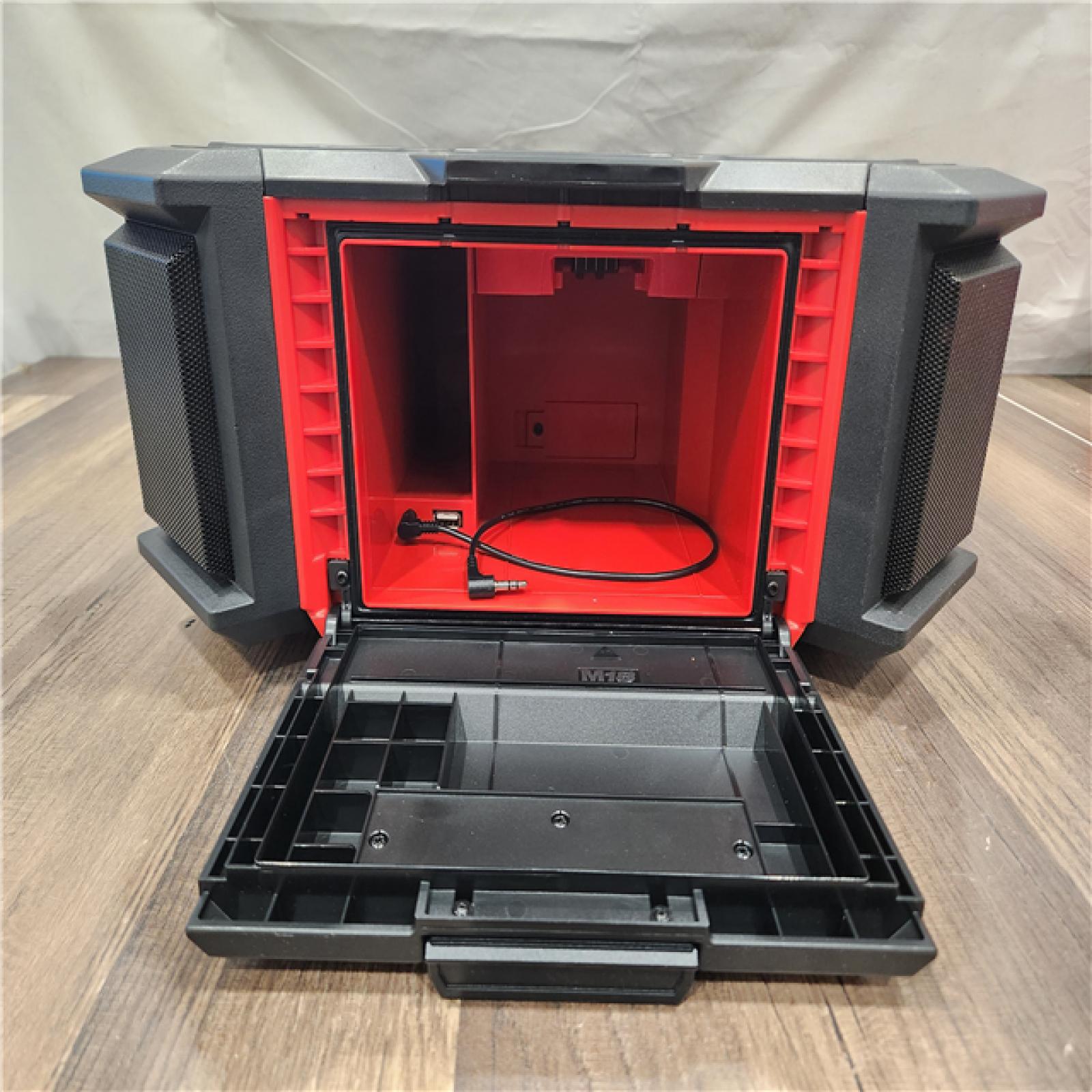 AS-IS- Milwaukee 18V M18 PACKOUT Lithium-Ion Cordless Radio + Charger (Tool Only)