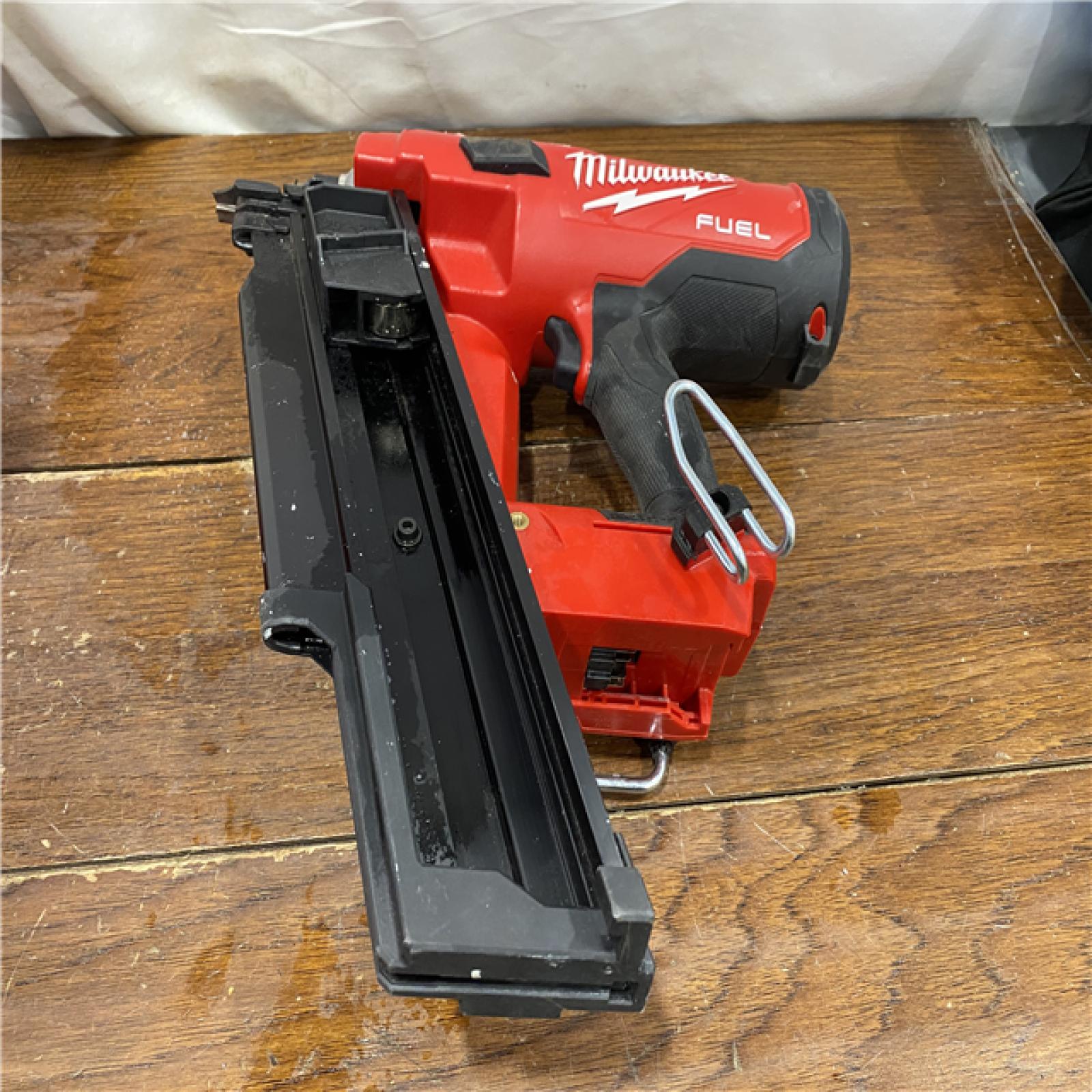 AS-IS Milwaukee 2744-20 M18 FUEL 3-1/2 in. 18-Volt 21-Degree Lithium-Ion Brushless Cordless Framing Nailer (Tool-Only)
