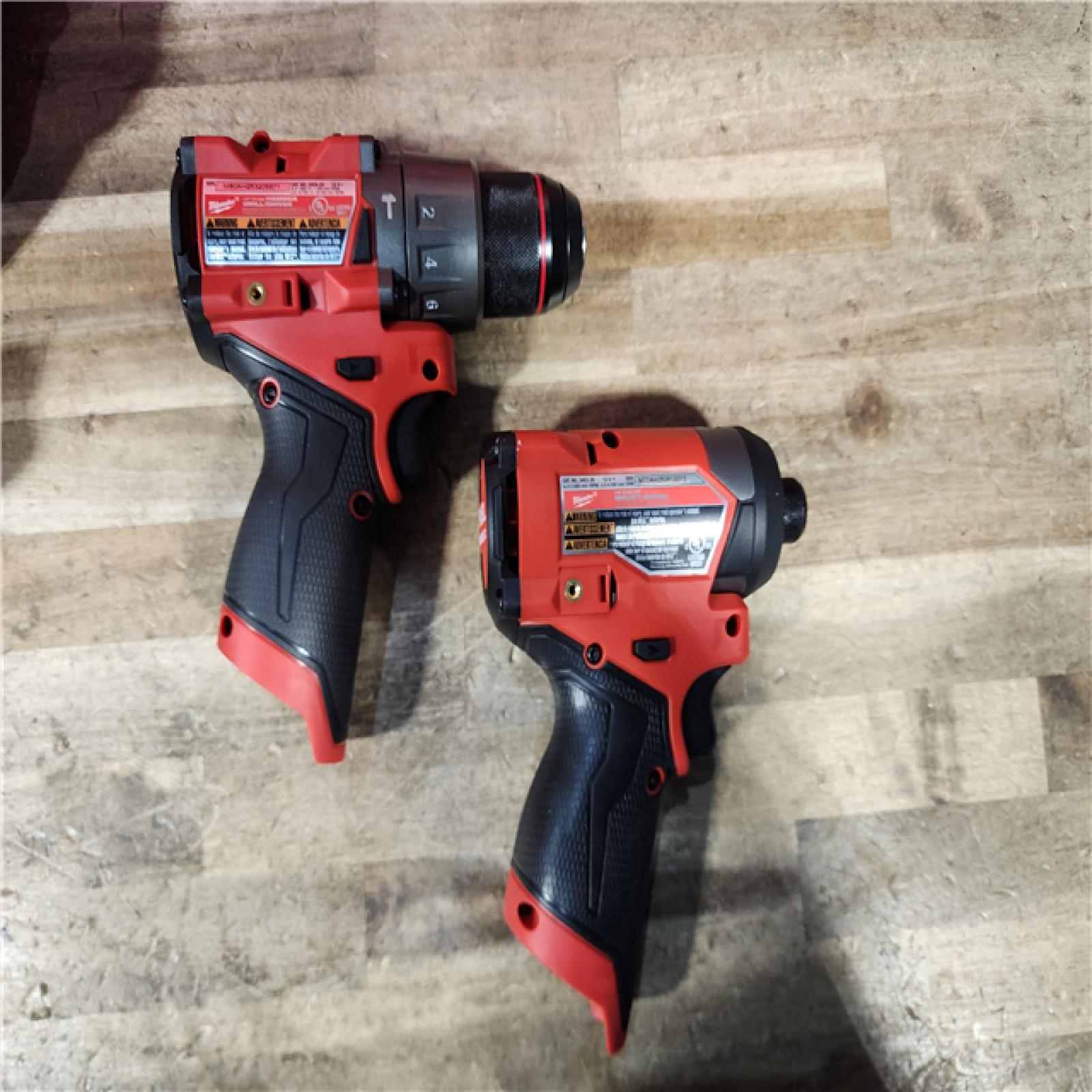 HOUSTON LOCATION - AS-IS Milwaukee FUEL 12-Volt Lithium-Ion Brushless Cordless Hammer Drill and Impact Driver Combo Kit