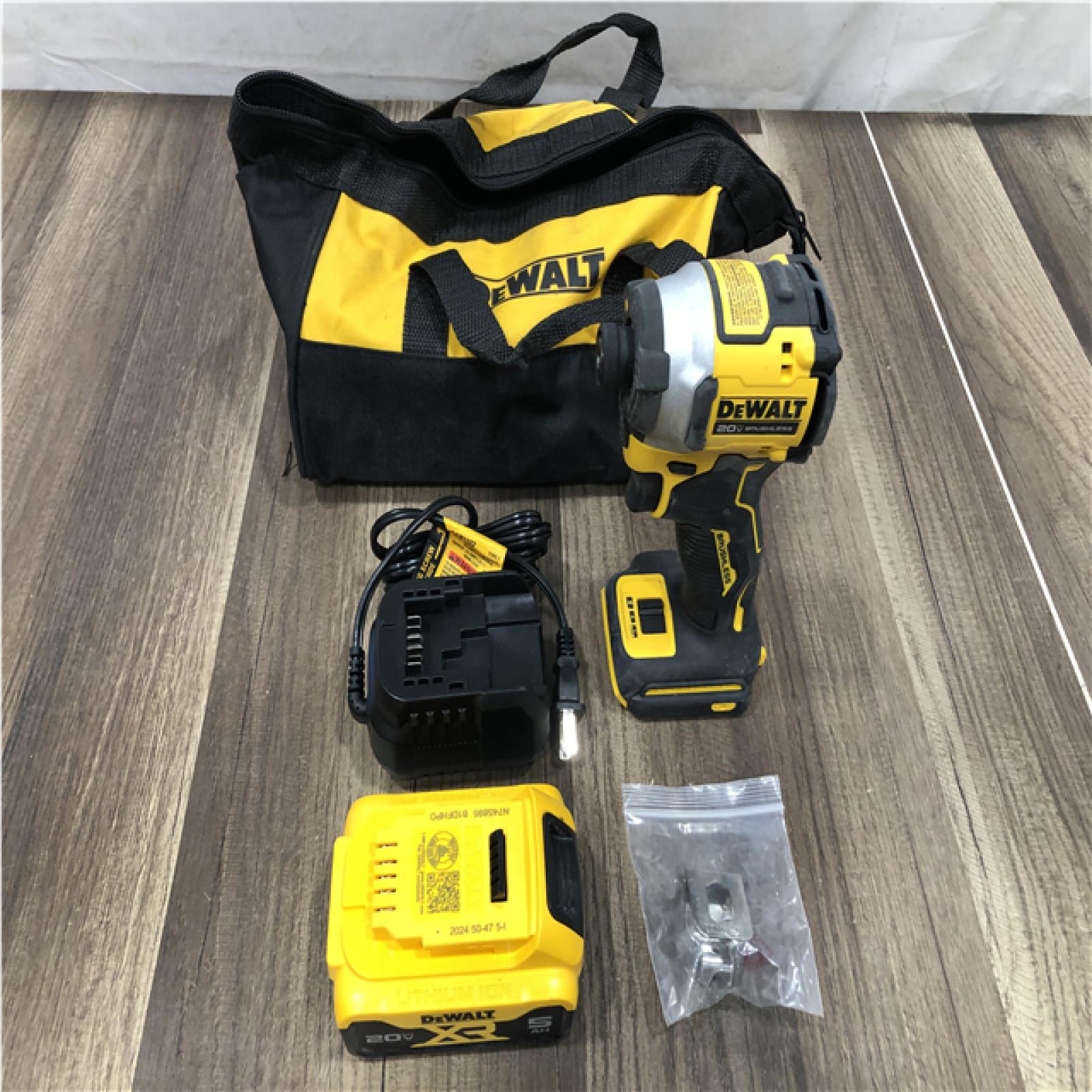 AS-IS DEWALT ATOMIC 20V MAX Lithium-Ion Cordless 1/4 in. Brushless Impact Driver Kit