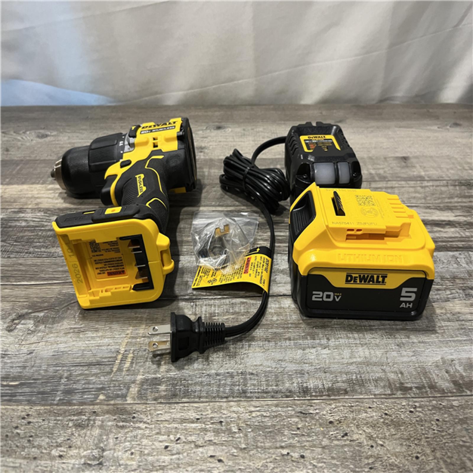 AS-IS DEWALT ATOMIC 20V Lithium-Ion Cordless 1/2 in. Hammer Drill Kit