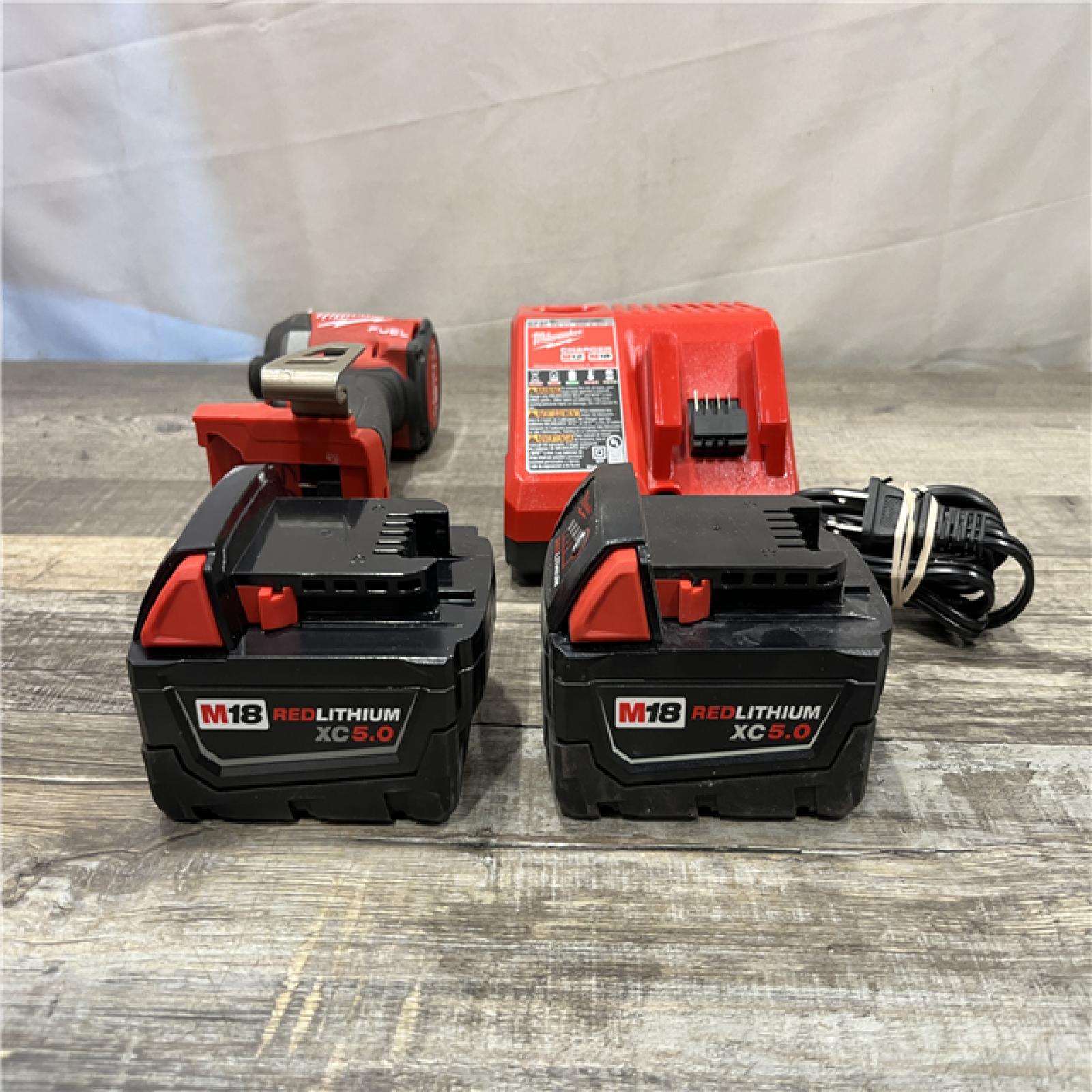 AS-IS Milwaukee FUEL 18V Lithium-Ion Brushless Cordless 1/4 in. Hex Impact Driver Kit