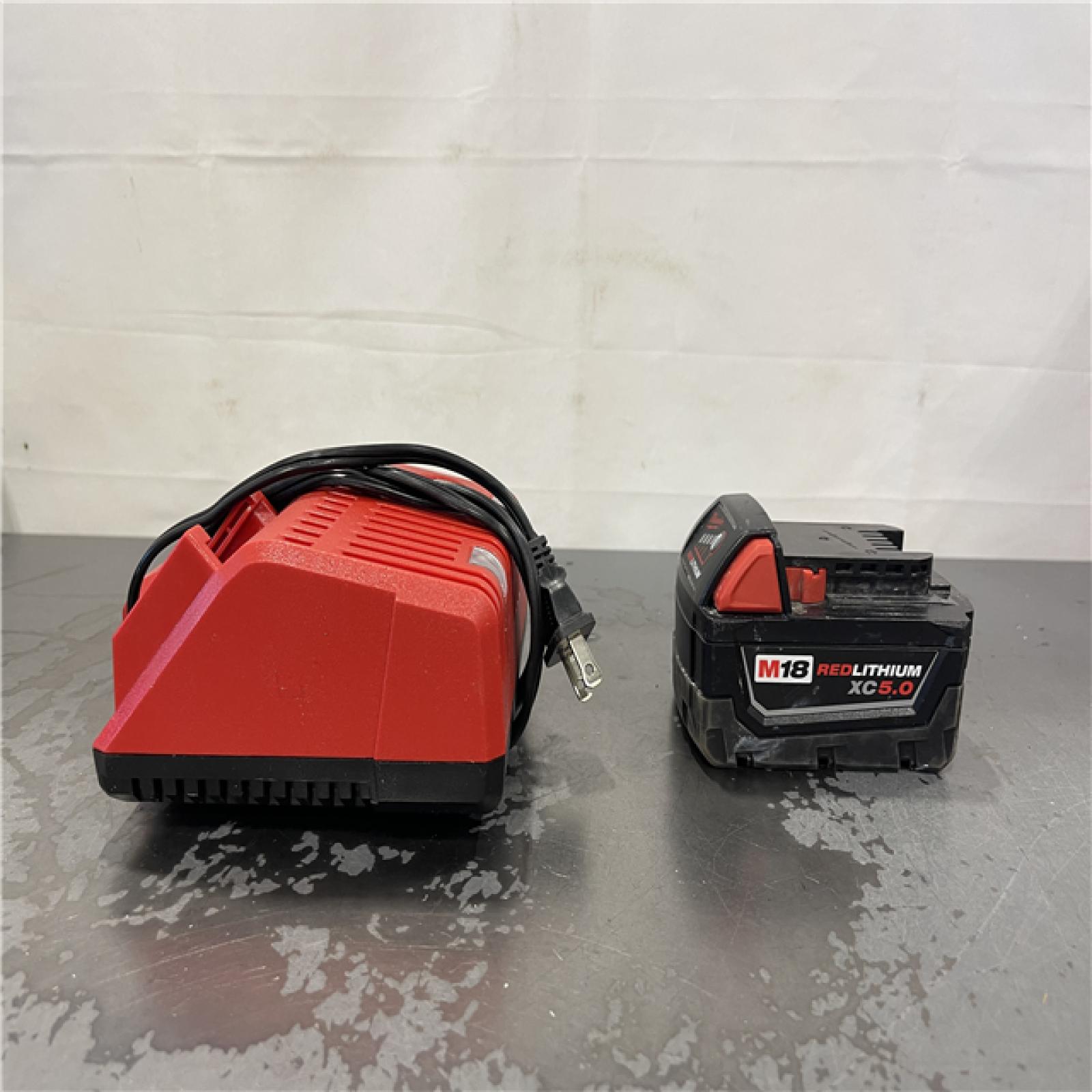 AS-IS- Milwaukee M18 18-Volt Lithium-Ion XC Battery Starter Kit