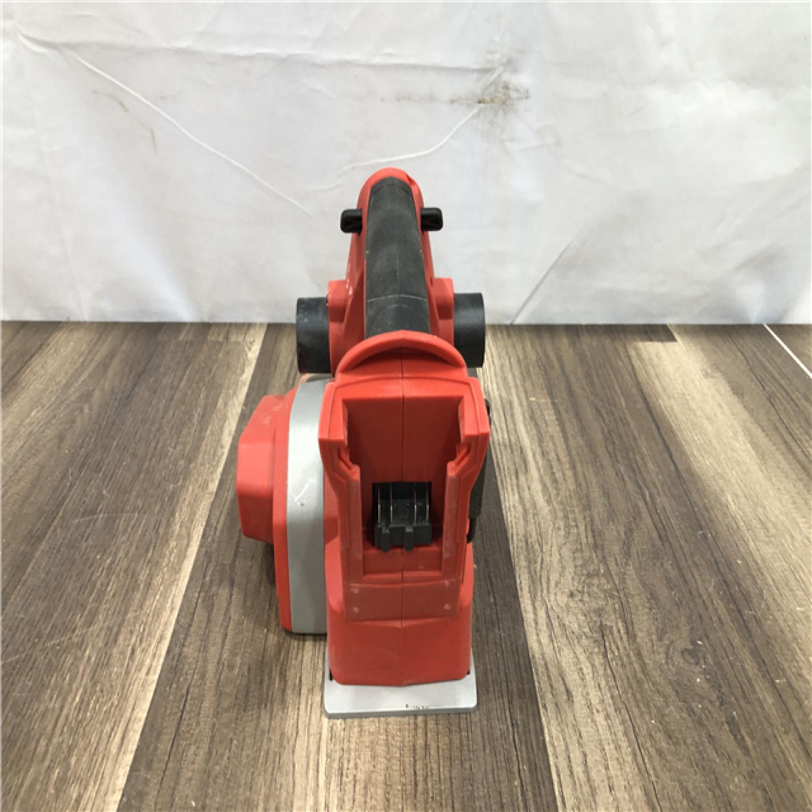 AS-IS Milwaukee M18 18V Lithium-Ion Cordless 3-1/4 in. Planer (Tool-Only)