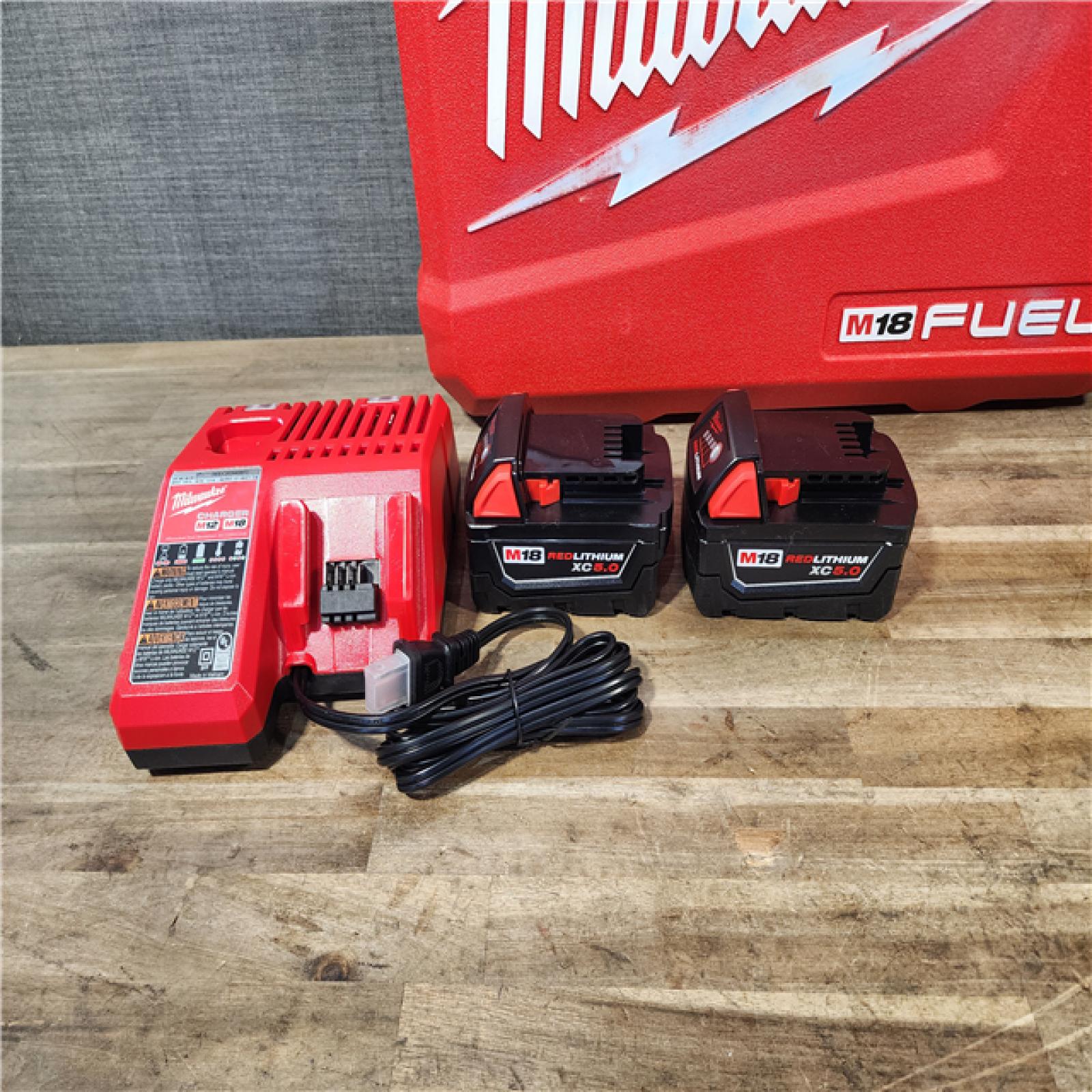 HOUSTON LOCATION - AS-IS (APPEARS LIKE NEW) Milwaukee FUEL 18V Lithium-Ion Brushless Cordless Hammer Drill and Impact Driver Combo Kit