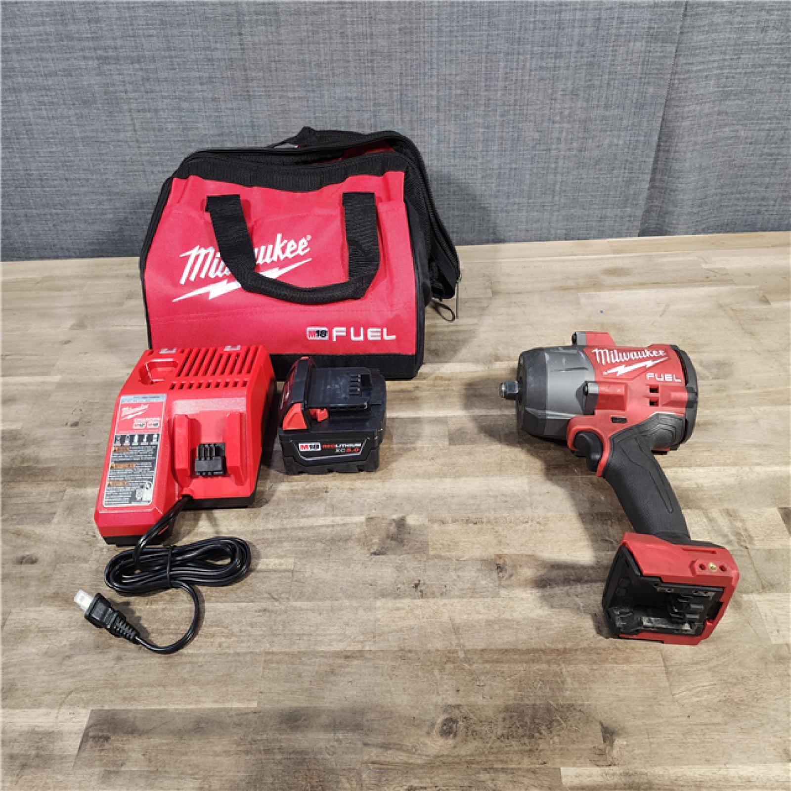 HOUSTON LOCATION - AS-IS Milwaukee M18 1/2 in. Cordless Brushless High Torque Impact Wrench Kit (Battery & Charger)