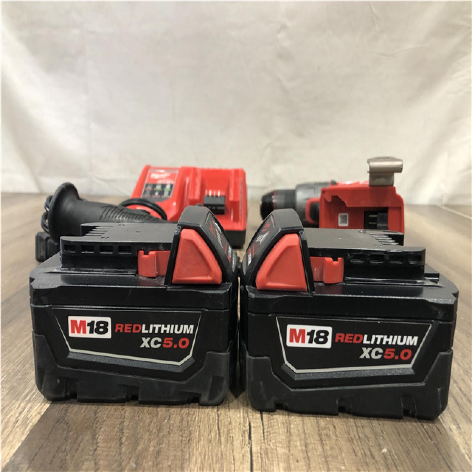 AS-IS Milwaukee FUEL 18V Lithium-Ion Brushless Cordless 1/2 in. Hammer Drill Driver Kit