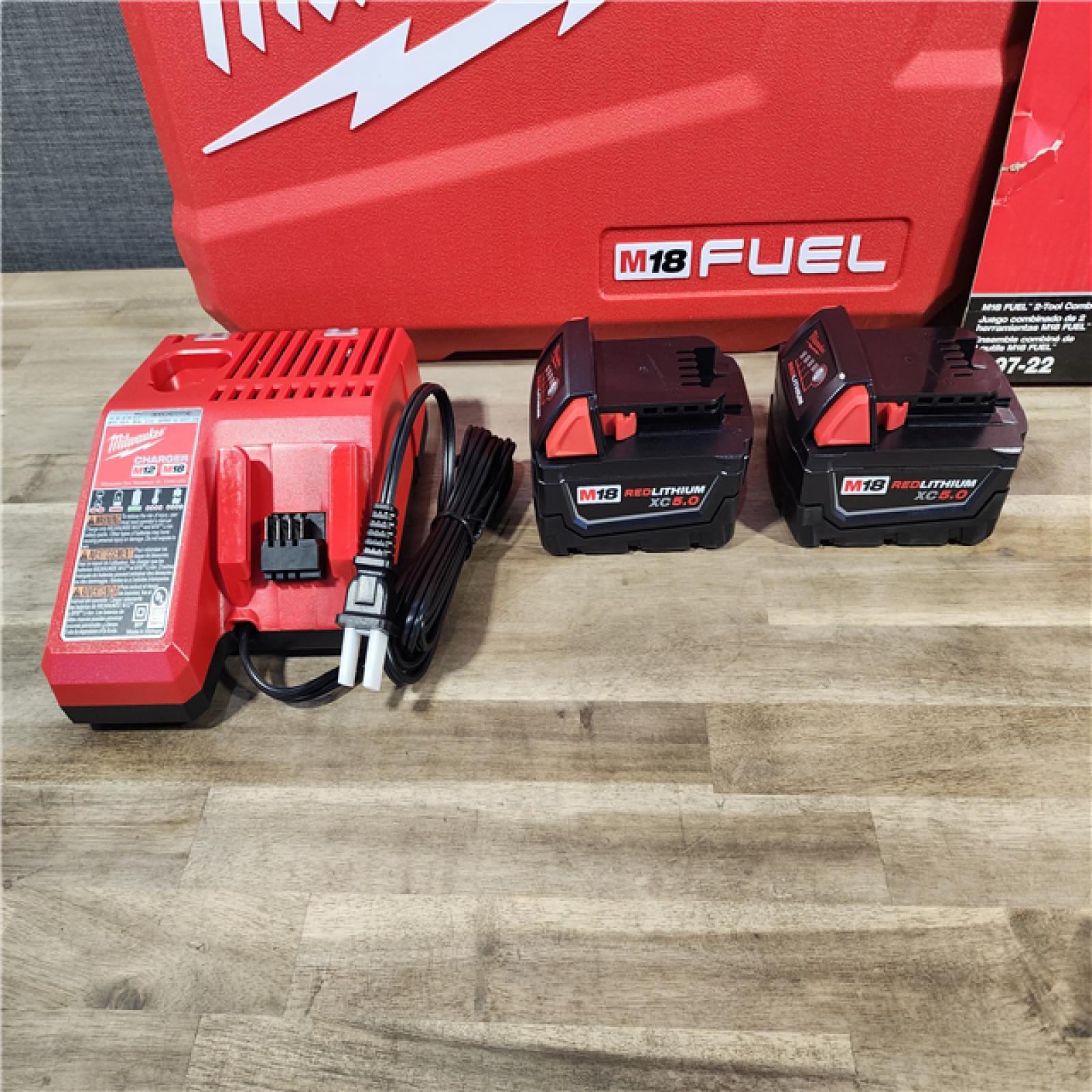HOUSTON LOCATION - AS-IS (APPEARS LIKE NEW) MILWAUKEE M18 FUEL 18V Lithium-Ion Brushless Cordless Hammer Drill and Impact Driver Combo Kit (2-Tool) with 2 Batteries