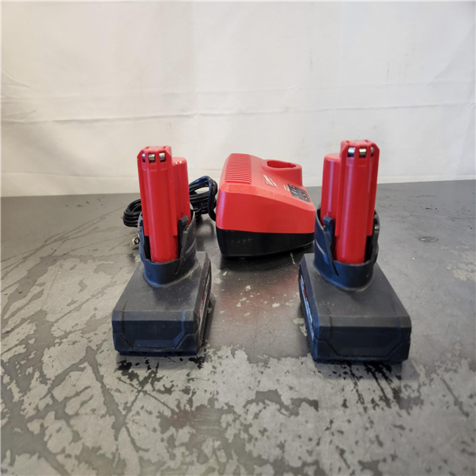 AS-IS- Milwaukee 12V Lithium-Ion XC High Output 5.0 Ah Battery Pack (2-Pack) Starter Kit with Charger