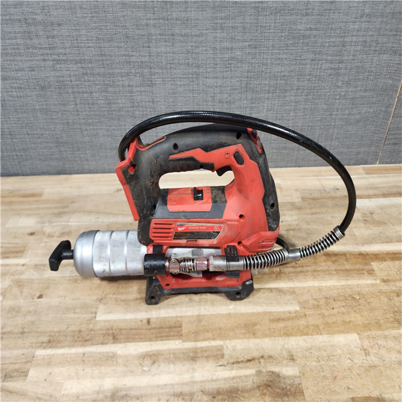 HOUSTON LOCATION - AS - IS Milwaukee 18V Lithium-Ion Cordless Grease Gun 2-Speed (Tool-Only)