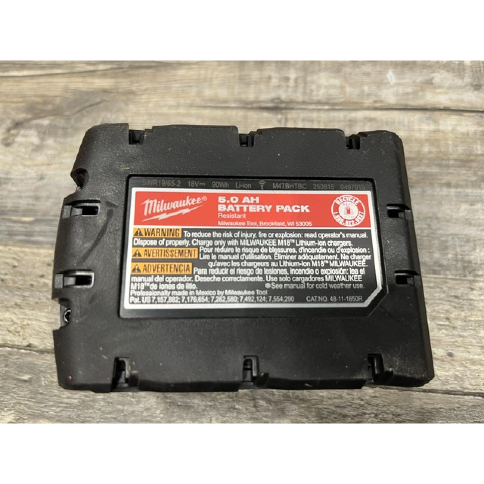 AS-IS Milwaukee 18-Volt Lithium-Ion XC Starter Kit with One 5.0Ah Battery and Charger