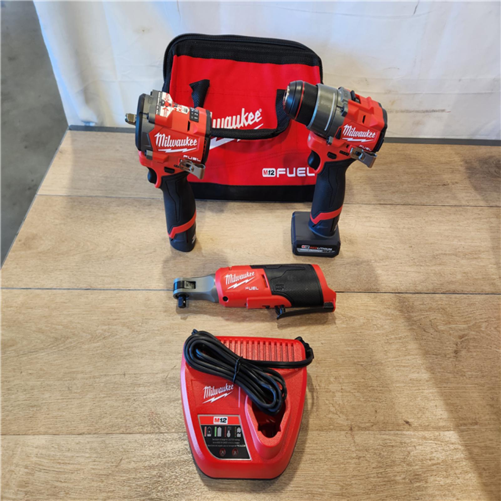 AS-IS- M12 FUEL 12V Lithium-Ion Cordless Drill Driver  Impact Wrench  and Ratchet Combo Kit (3-Tool) W/Batteries  Charger & Bag