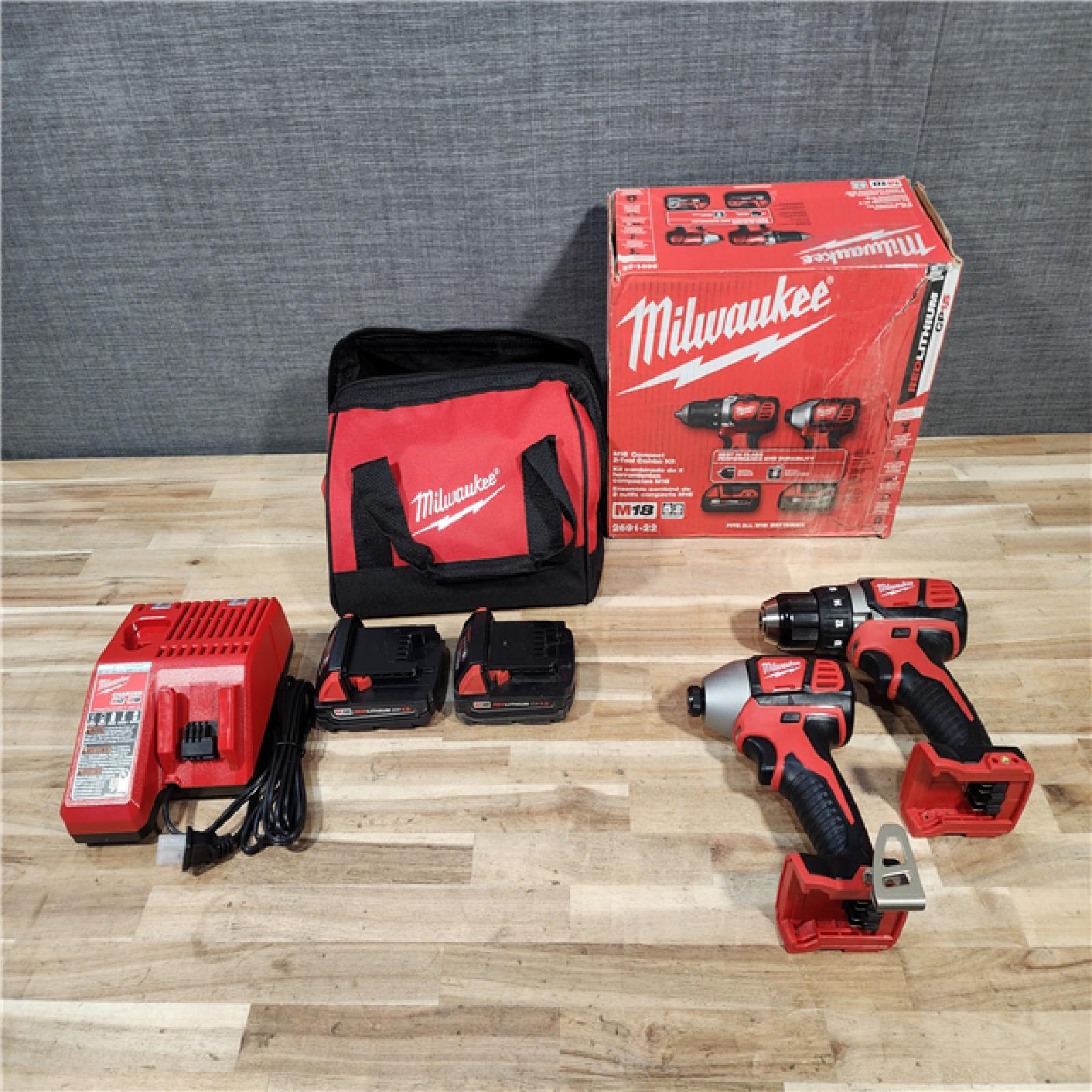 HOUSTON LOCATION - AS-IS Milwaukee M18 Brushed Cordless (2-Tool) Drill/Driver and Impact Driver Kit