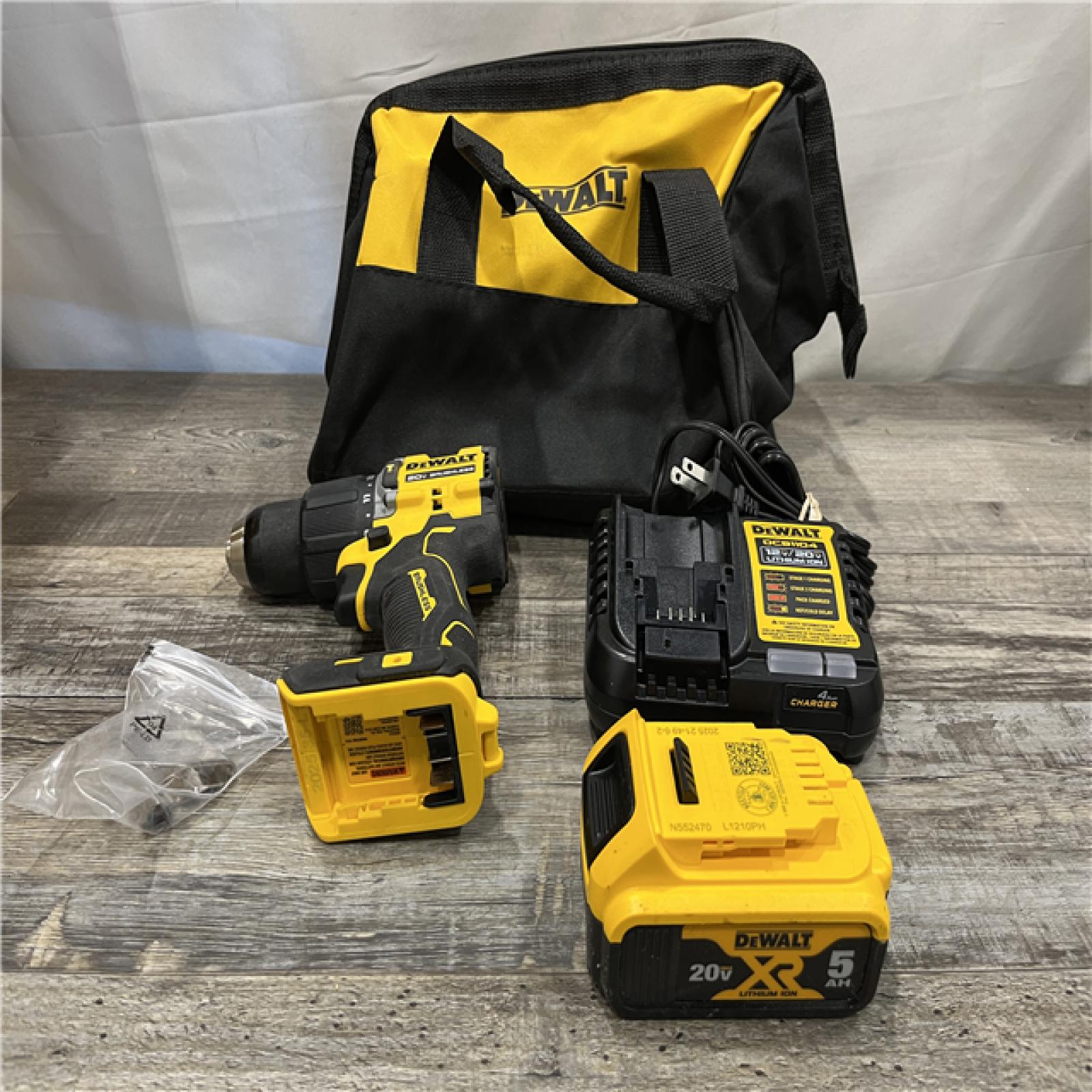 AS-IS DEWALT ATOMIC 20V Lithium-Ion Cordless 1/2 in. Hammer Drill Kit