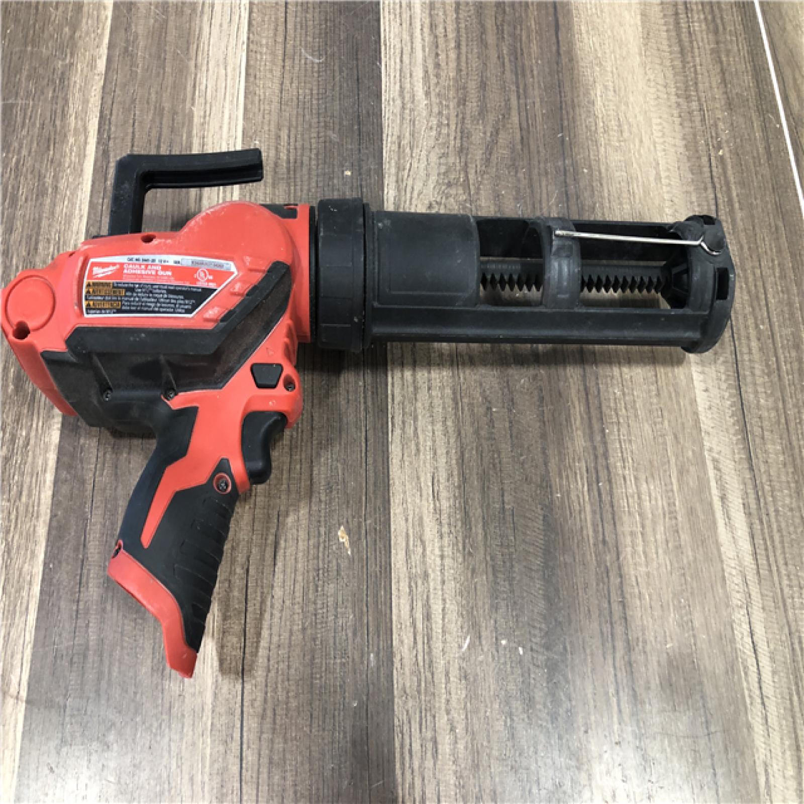 AS-IS Milwaukee 12V Lithium-Ion Cordless 10 oz. Adhesive and Caulk Gun (Tool-Only)