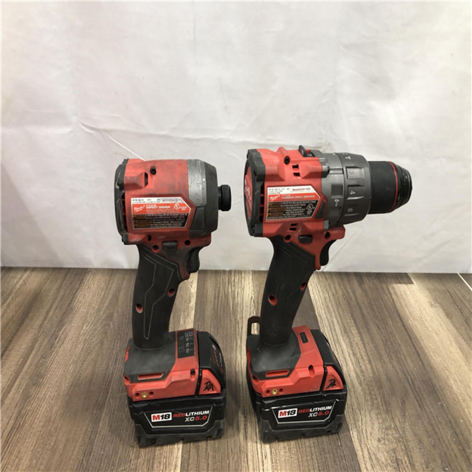 AS-IS Milwaukee FUEL 18V Lithium-Ion Brushless Cordless Hammer Drill and Impact Driver Combo Kit