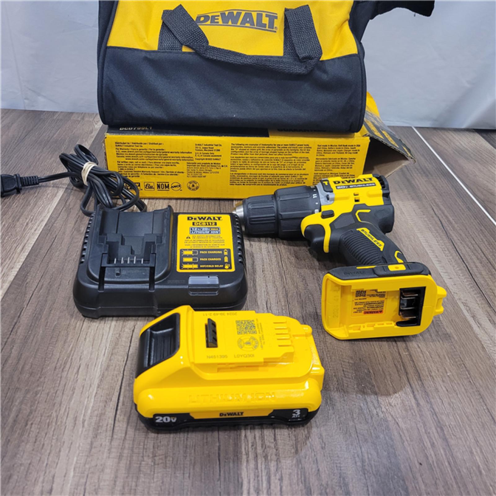 AS-IS DEWALT ATOMIC 20-Volt Lithium-Ion Cordless 1/2 in. Compact Hammer Drill with 3.0Ah Battery, Charger and Bag