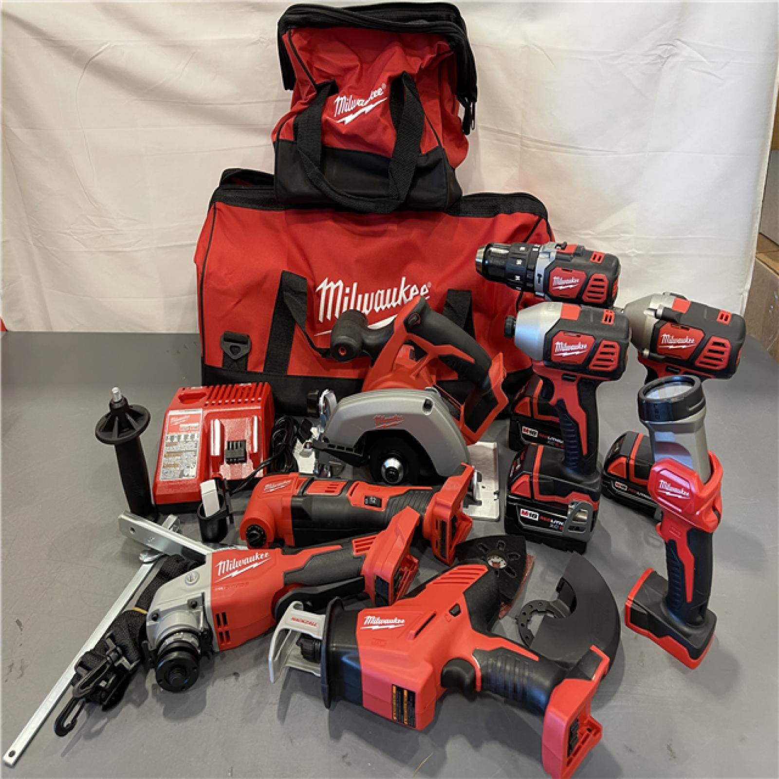 AS-IS - Milwaukee M18 18V Lithium-Ion Cordless Combo Kit (8-Tool) with (3) Batteries, Charger and (2) Tool Bags