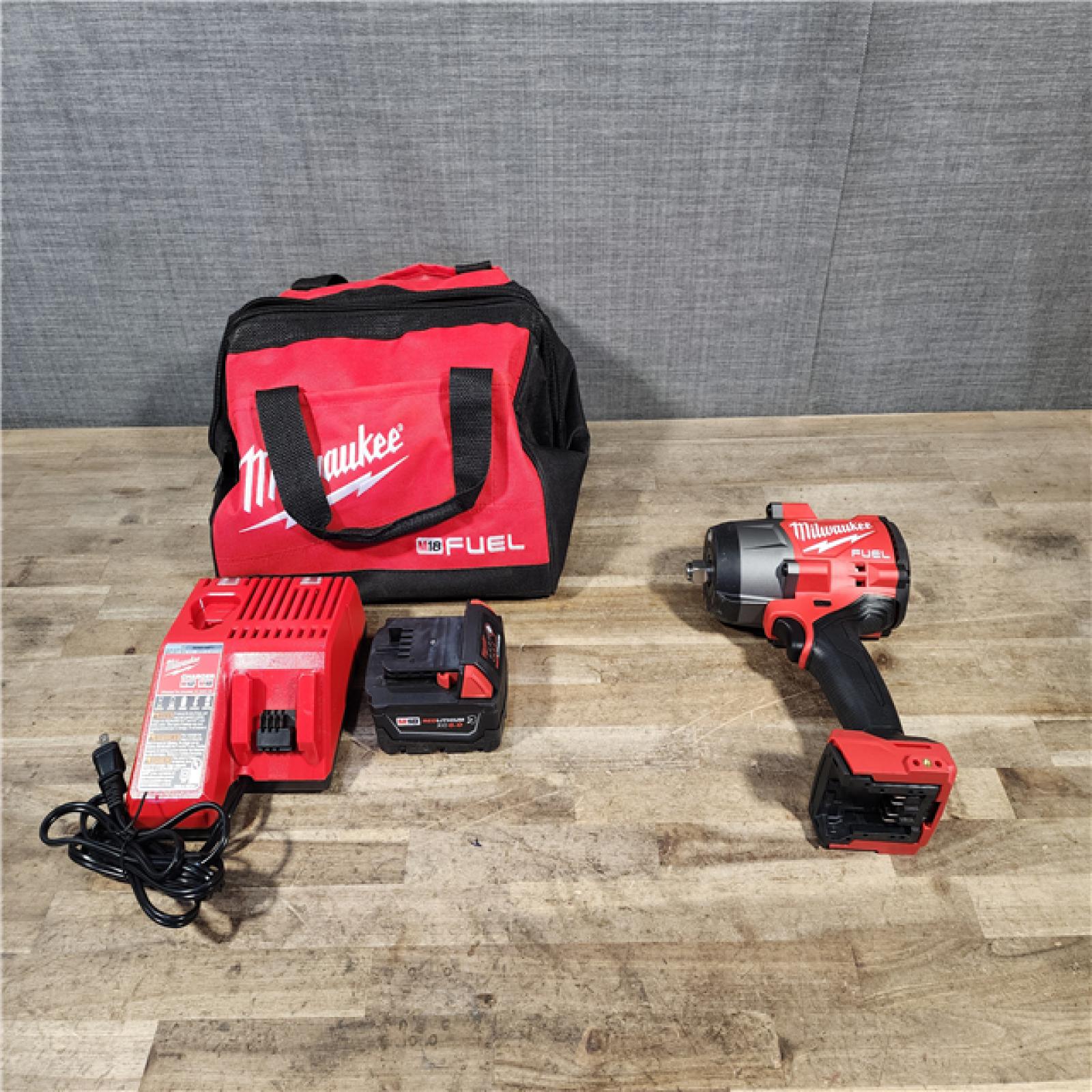 HOUSTON LOCATION - AS-IS Milwaukee M18 1/2 in. Cordless Brushless High Torque Impact Wrench Kit (Battery & Charger)