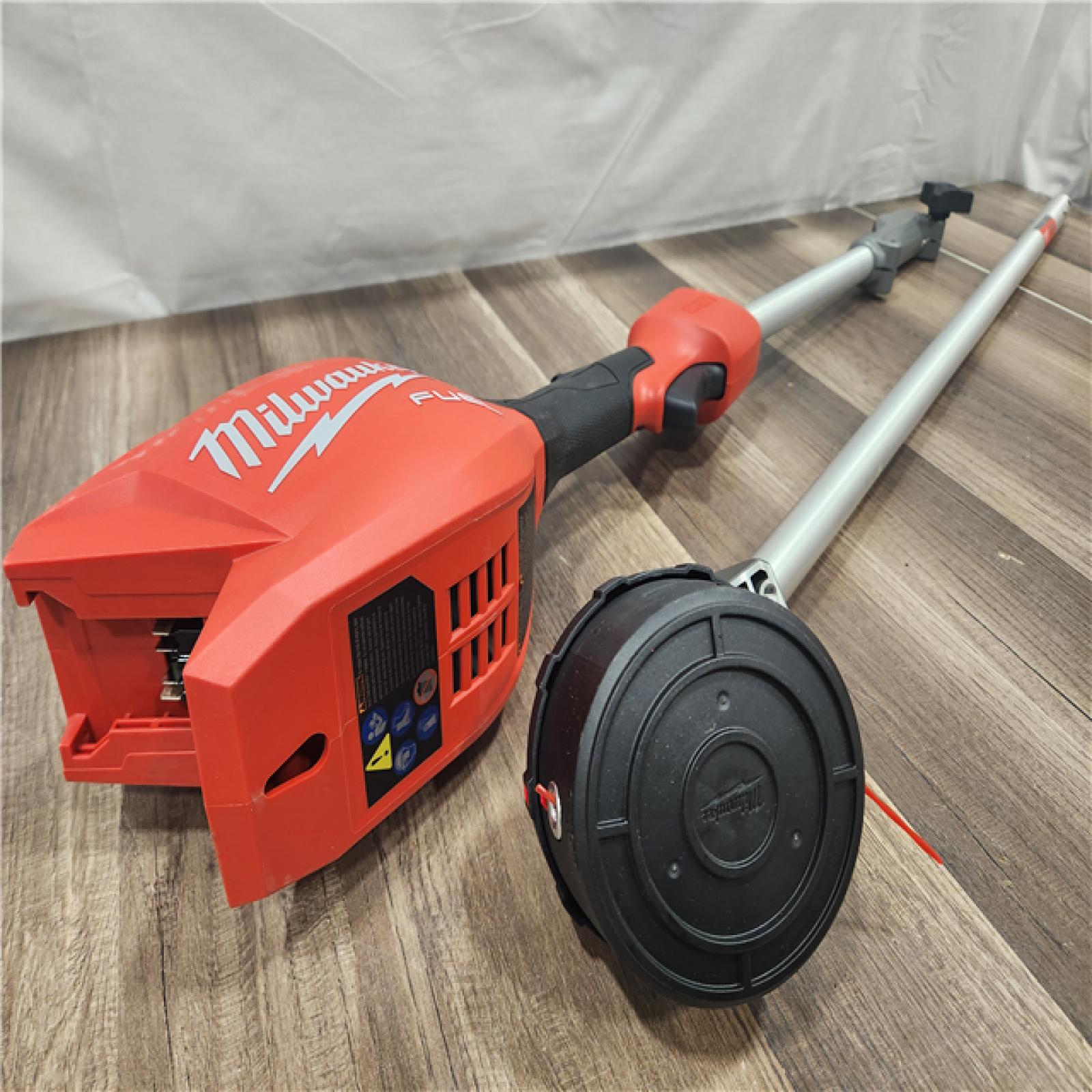 AS-IS- M18 FUEL 18V 16 in. Brushless Cordless Battery Powered String Trimmer W/QUIK-LOK Attachment Capability & 8.0 Ah Battery