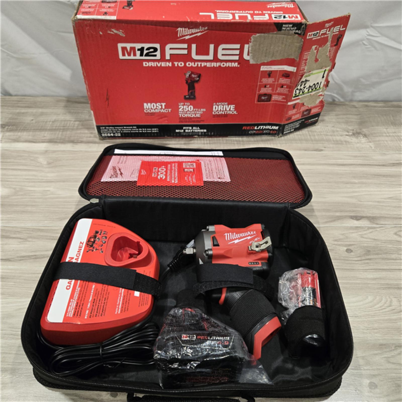 LIKE NEW- Milwaukee 2554-22 M12 FUEL Stubby 3/8 in. Impact Wrench Kit (2 Ah/4 Ah)