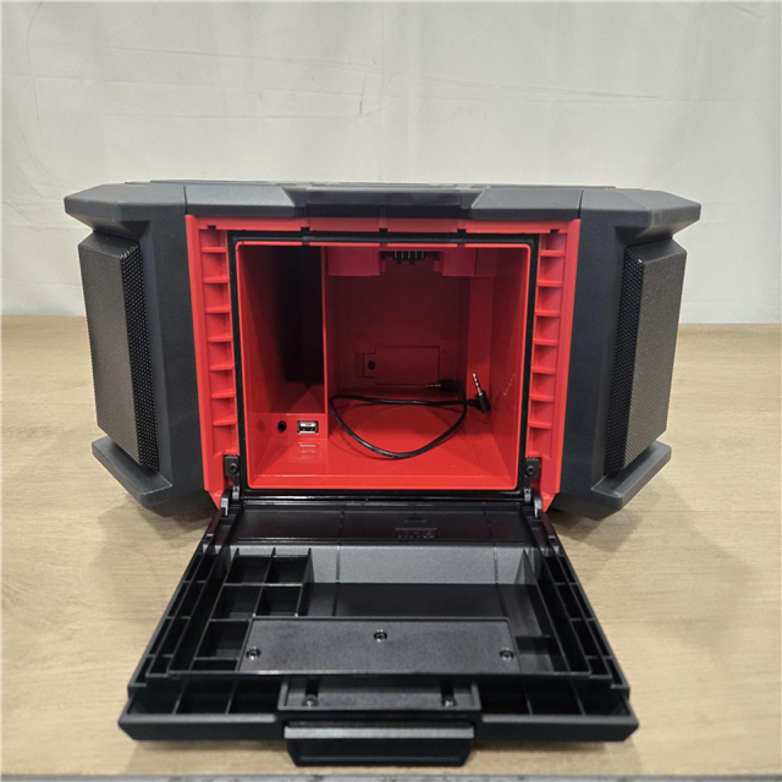 AS-IS Milwaukee Lithium-Ion Cordless PACKOUT Radio/Speaker with Built-In Charger