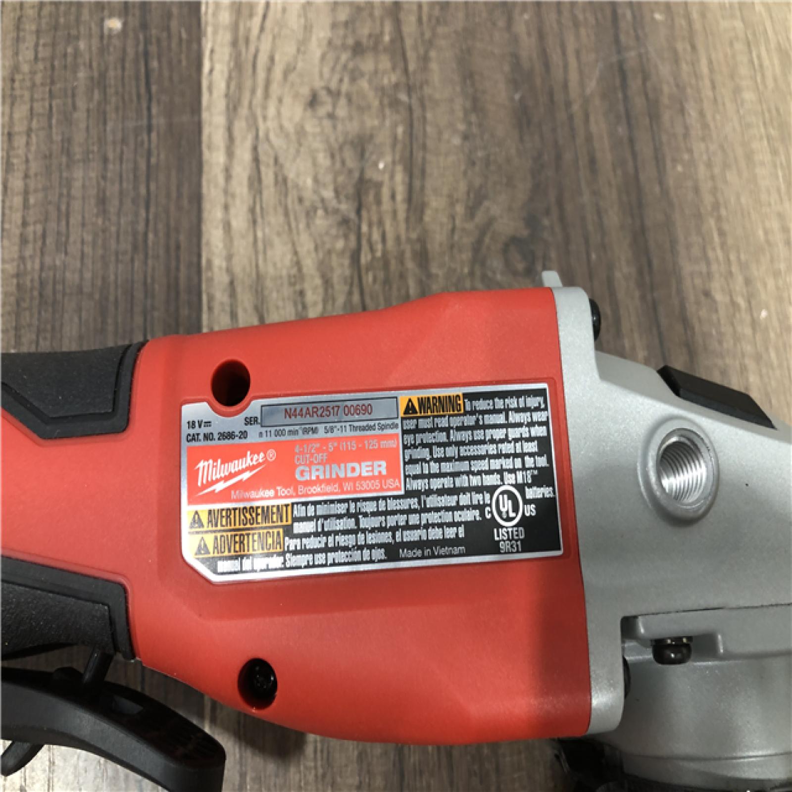 AS-IS Milwaukee 18V Lithium-Ion Brushless Cordless 4-1/2 in./5 in. Grinder w/Paddle Switch (Tool-Only)