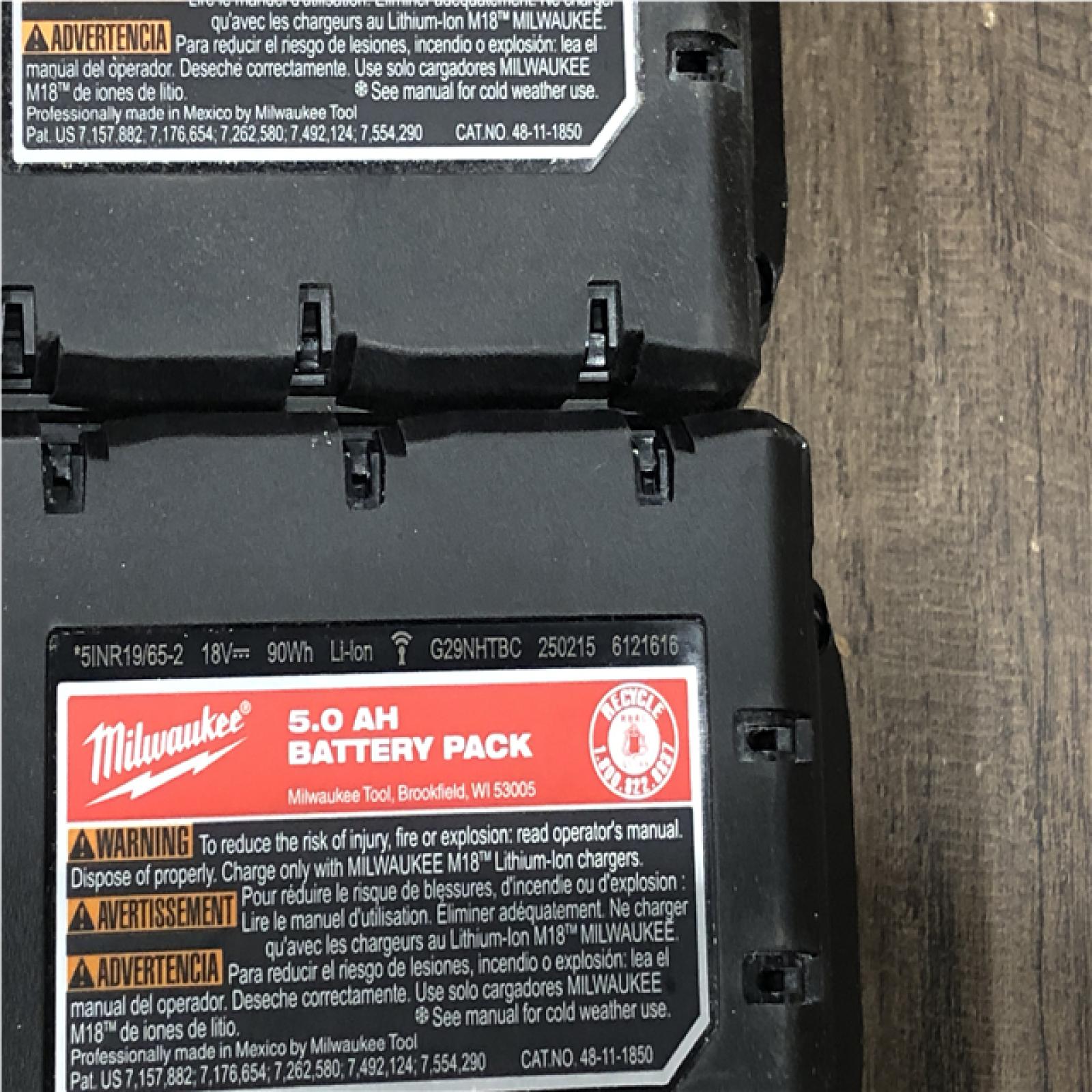 AS-IS Milwaukee 18-Volt Lithium-Ion XC Starter Kit with (2) 5.0Ah Batteries and Charger
