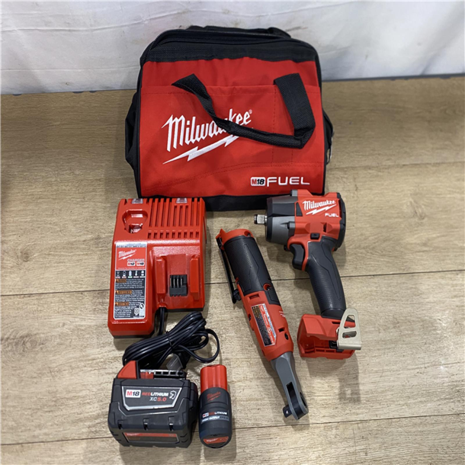 AS-IS MILWAUKEE M18 FUEL 18V Cordless Mid Torque 1/2 in. Impact Wrench W/ M12 FUEL 3/8 in. Ratchet & Battery/Charger Combo Kit