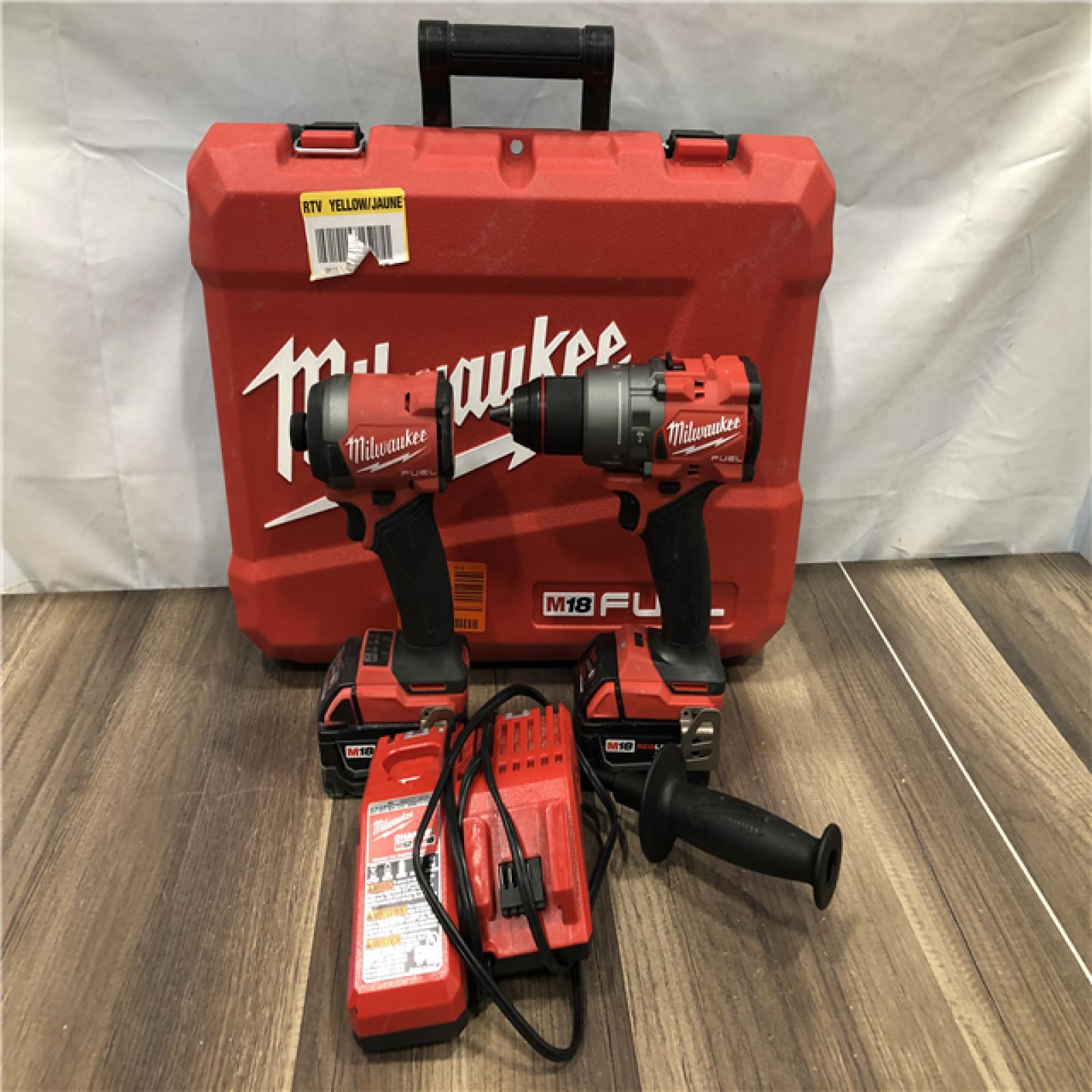 AS-IS Milwaukee FUEL 18V Lithium-Ion Brushless Cordless Hammer Drill and Impact Driver Combo Kit