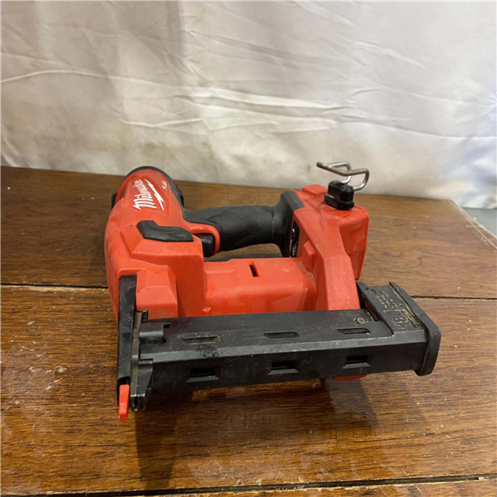AS-IS MILWAUKEE M18 FUEL 18-Volt Lithium-Ion Brushless Cordless 18-Gauge 1/4 in. Narrow Crown Stapler (Tool-Only)
