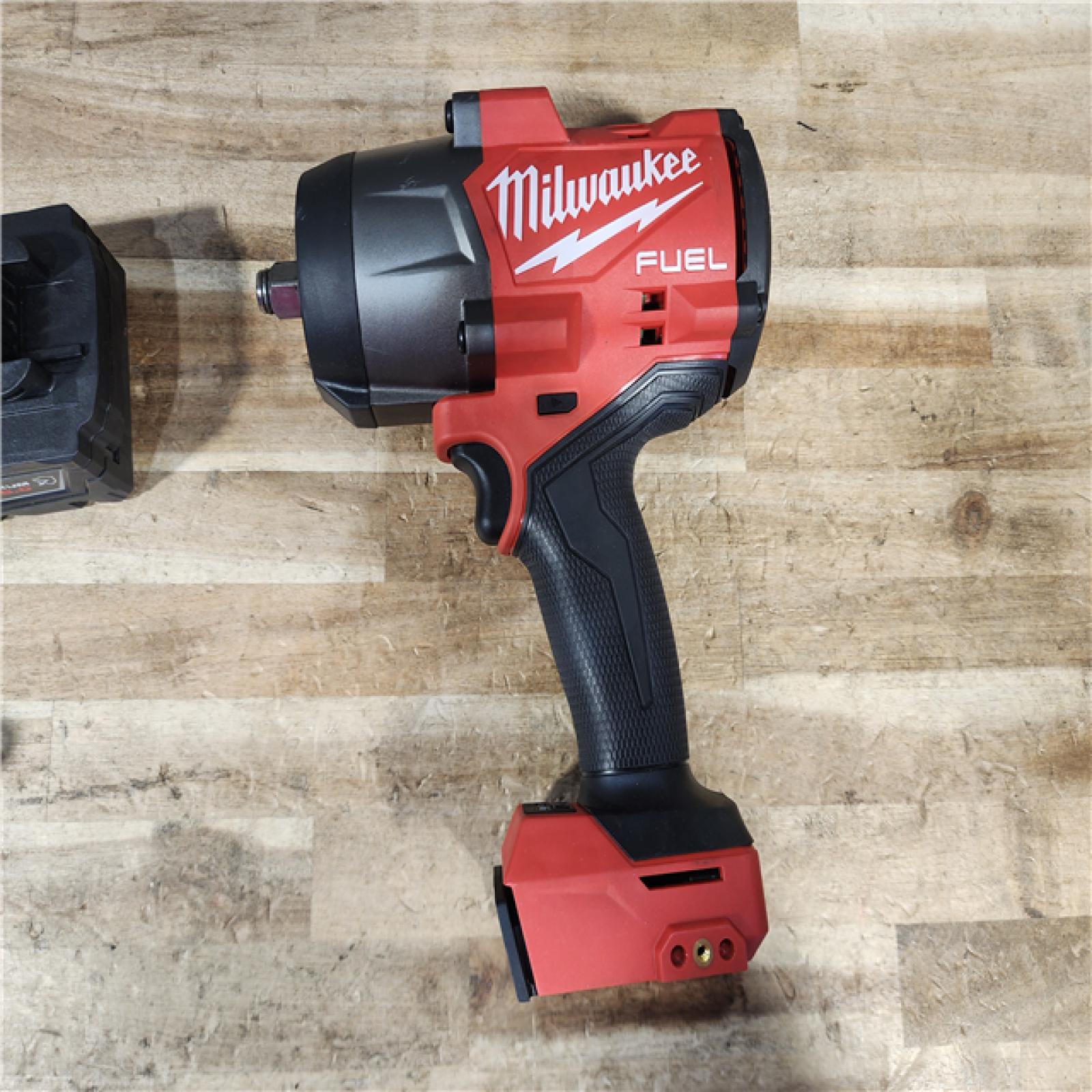 HOUSTON LOCATION - AS - IS Milwaukee FUEL 18V Lithium-Ion Brushless Cordless 1/2 in. Impact Wrench with Friction Ring W/ BATTERY & CHARGER