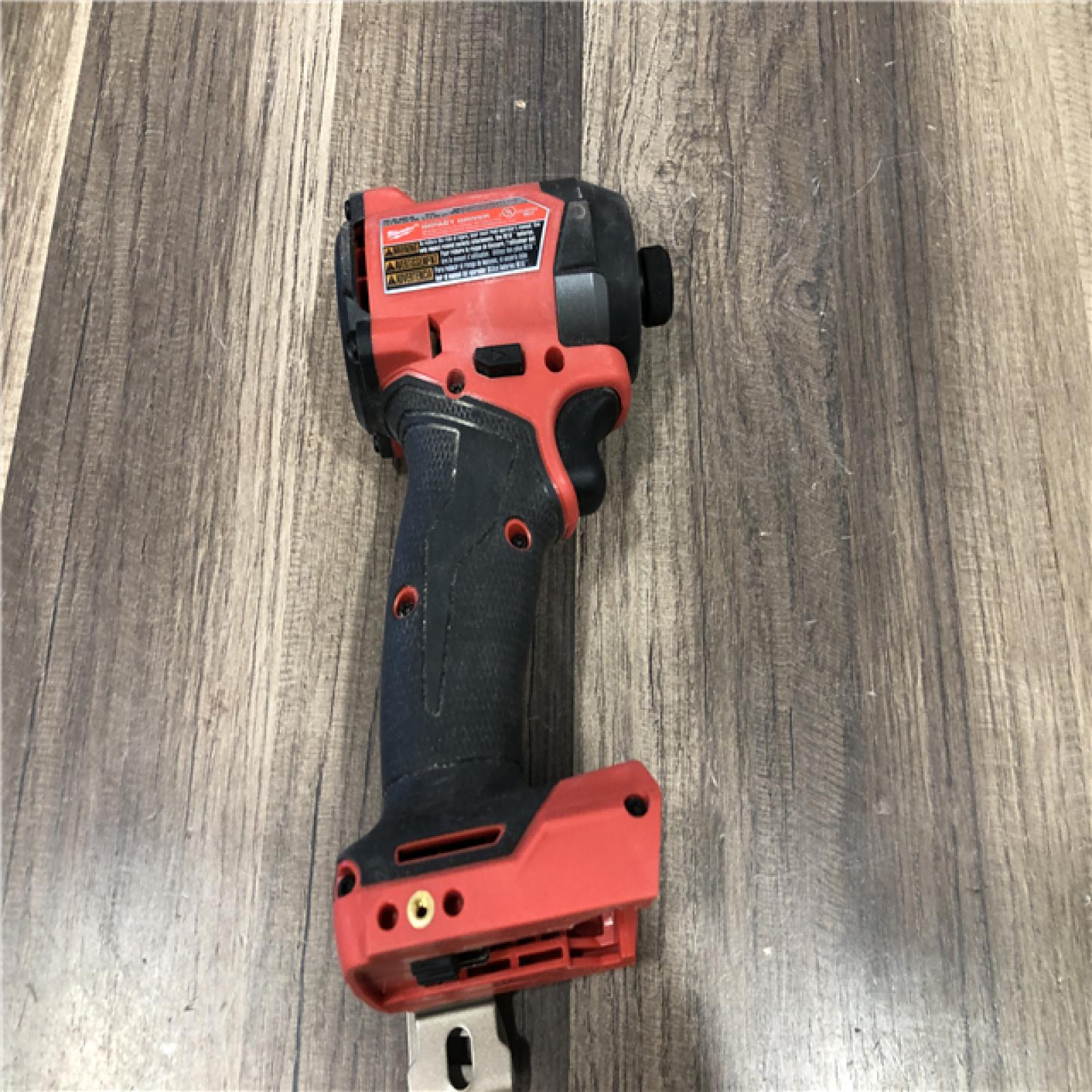 AS-IS Milwaukee  FUEL 18V Lithium-Ion Brushless Cordless 1/4 in. Hex Impact Driver (Tool-Only)
