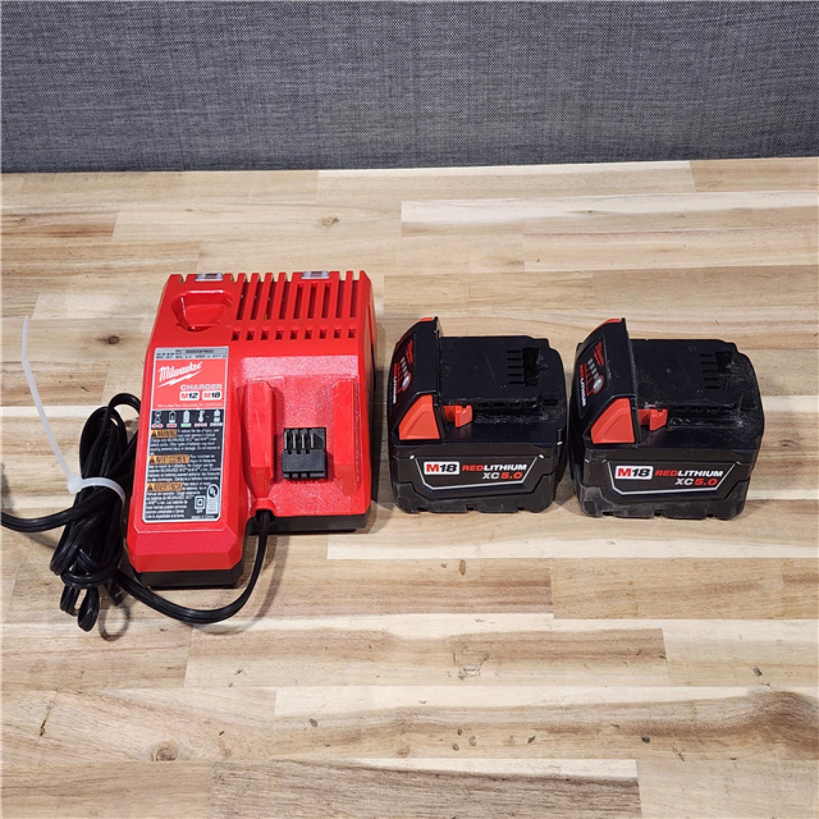 HOUSTON LOCATION - AS-IS MILWAUKEE 2 TOOL COMBO KIT W/ (2) BATTERY & CHARGER
