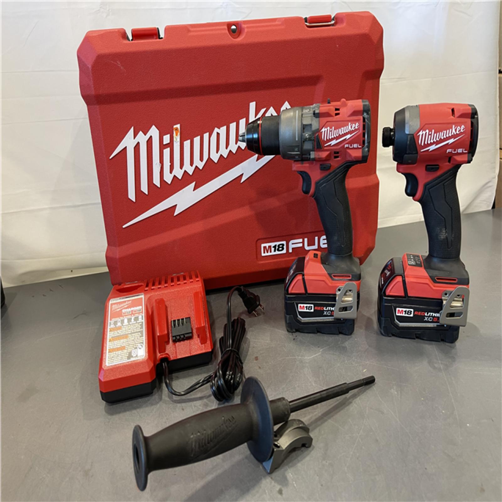 AS-IS - MILWAUKEE FUEL 18V Lithium-Ion Brushless Cordless Hammer Drill and Impact Driver Combo Kit