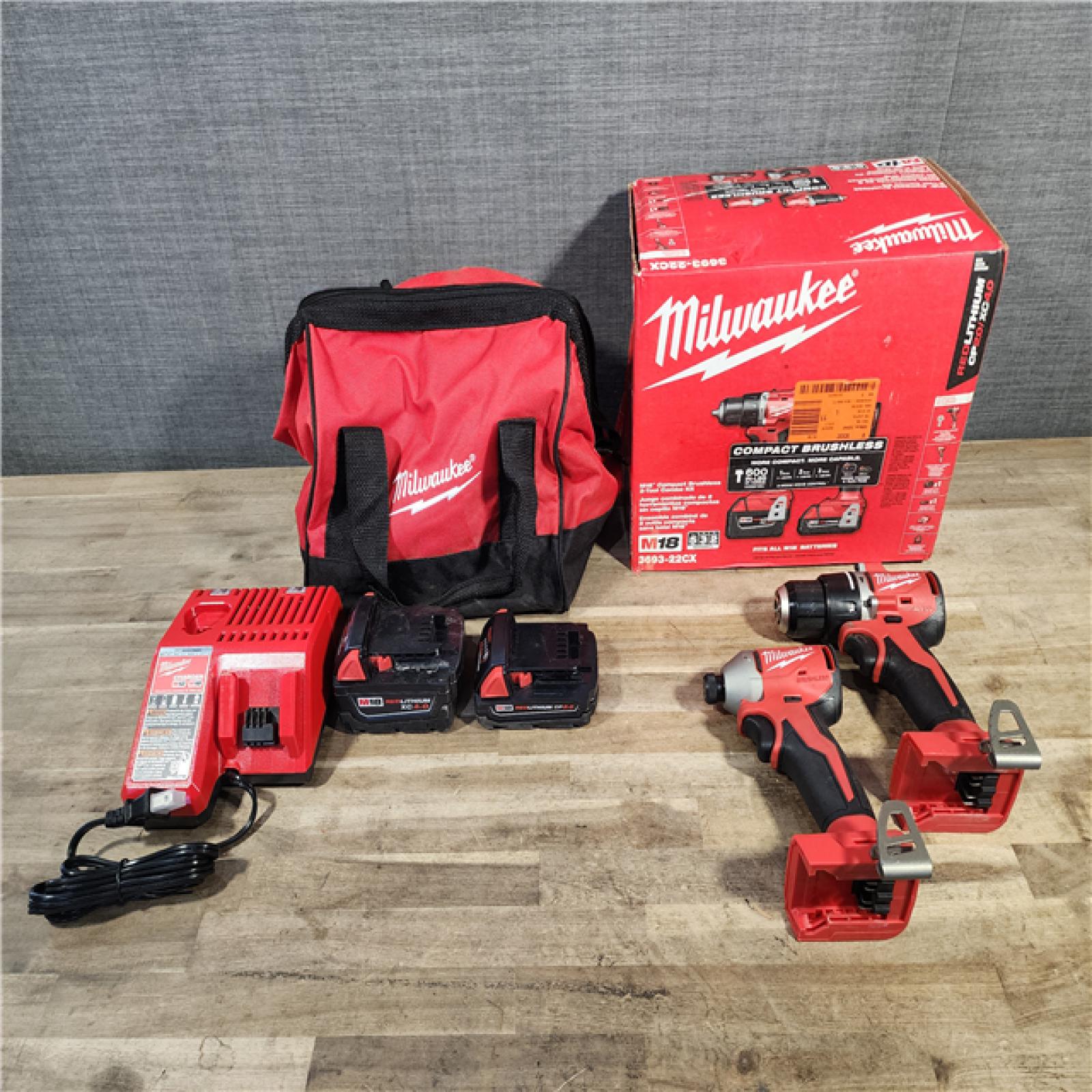 HOUSTON LOCATION - AS-IS M18 18-Volt Lithium-Ion Brushless Cordless Compact Hammer Drill/Impact Combo Kit (2-Tool) with (2) Batteries, Bag