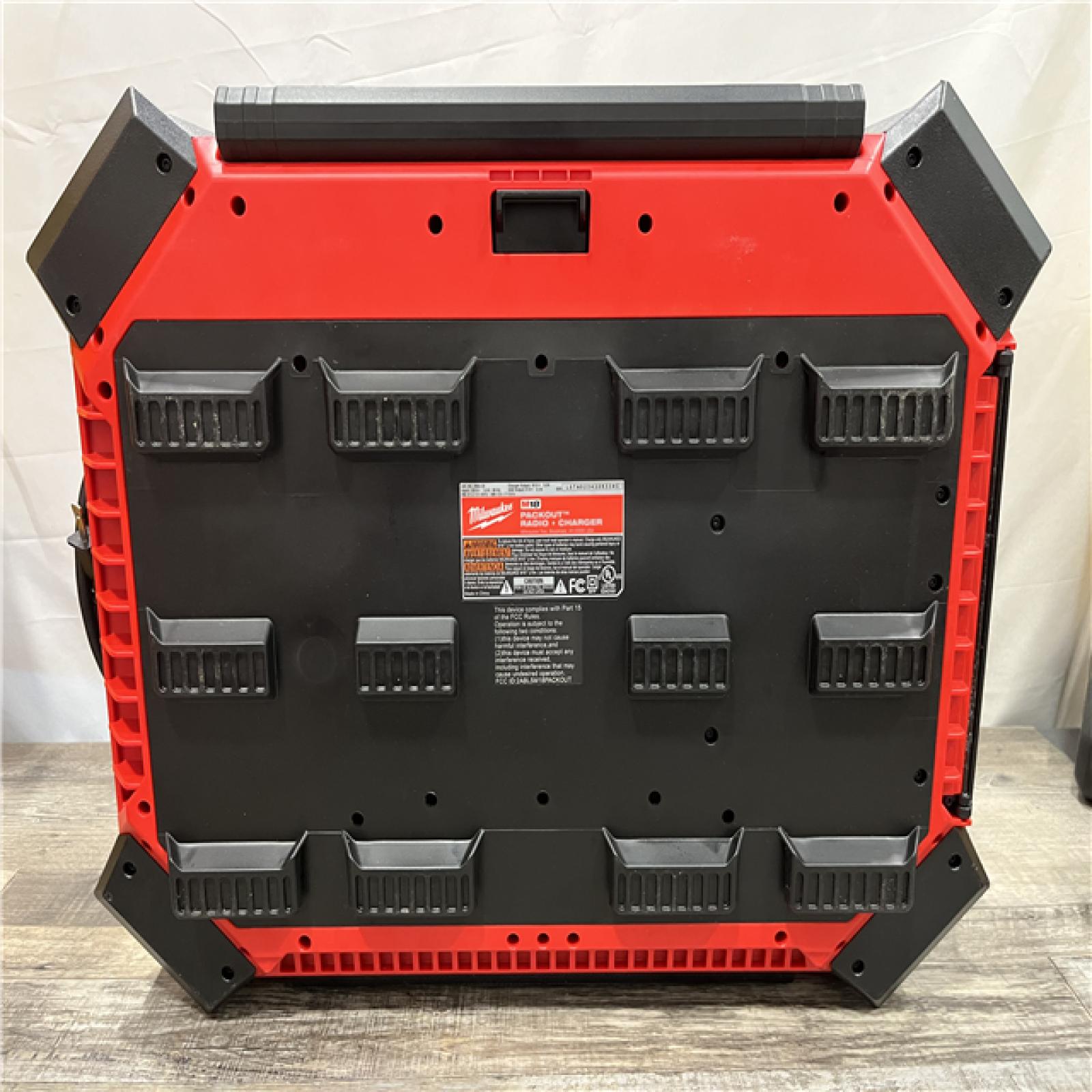 AS-IS Milwaukee  Lithium-Ion Cordless PACKOUT Radio/Speaker with Built-In Charger