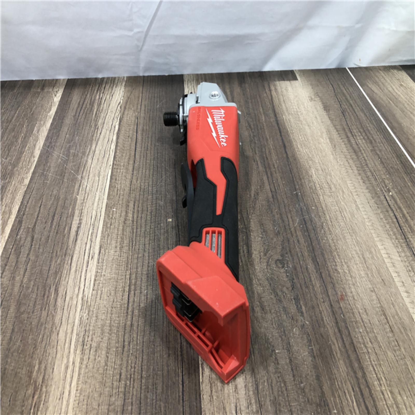AS-IS Milwaukee 18V Lithium-Ion Brushless Cordless 4-1/2 in./5 in. Grinder w/Paddle Switch (Tool-Only)