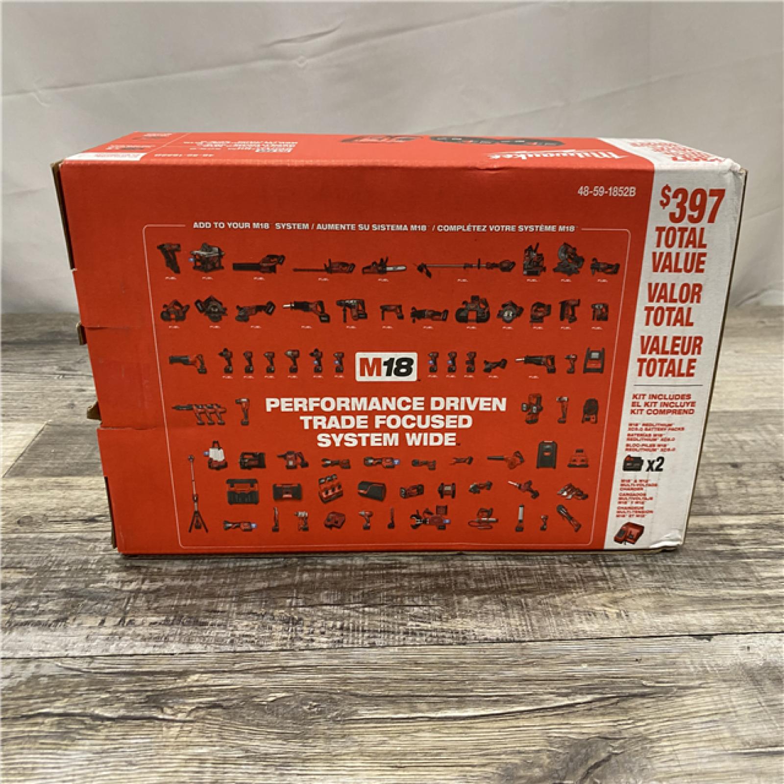 NEW - Milwaukee 18-Volt Lithium-Ion XC Starter Kit with Two 5.0Ah Batteries and Charger