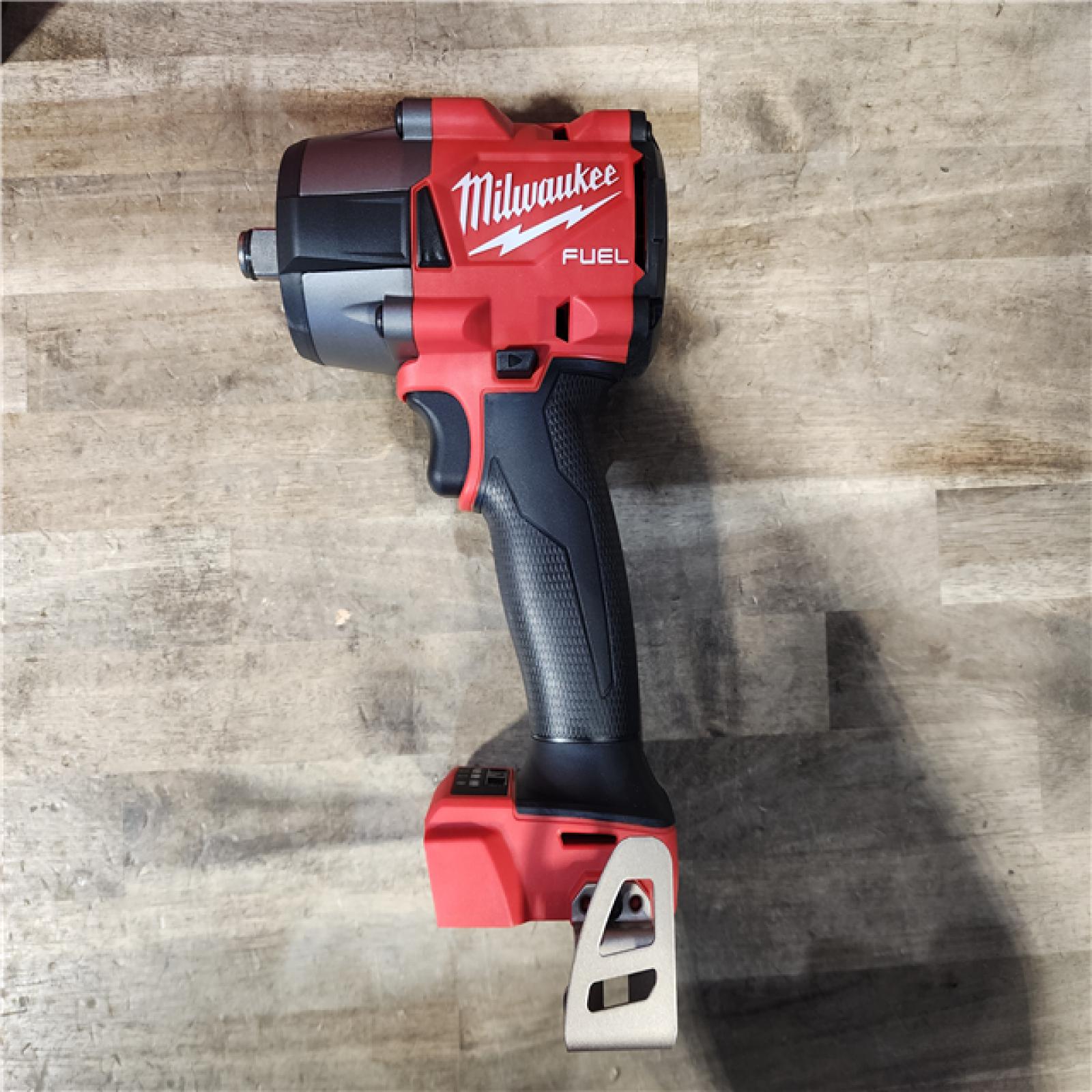 HOUSTON LOCATION - AS-IS (APPEARS LIKE NEW) Milwaukee M18 FUEL 1/2 in. Cordless Brushless Mid-Torque Impact Wrench Kit (Battery & Charger)