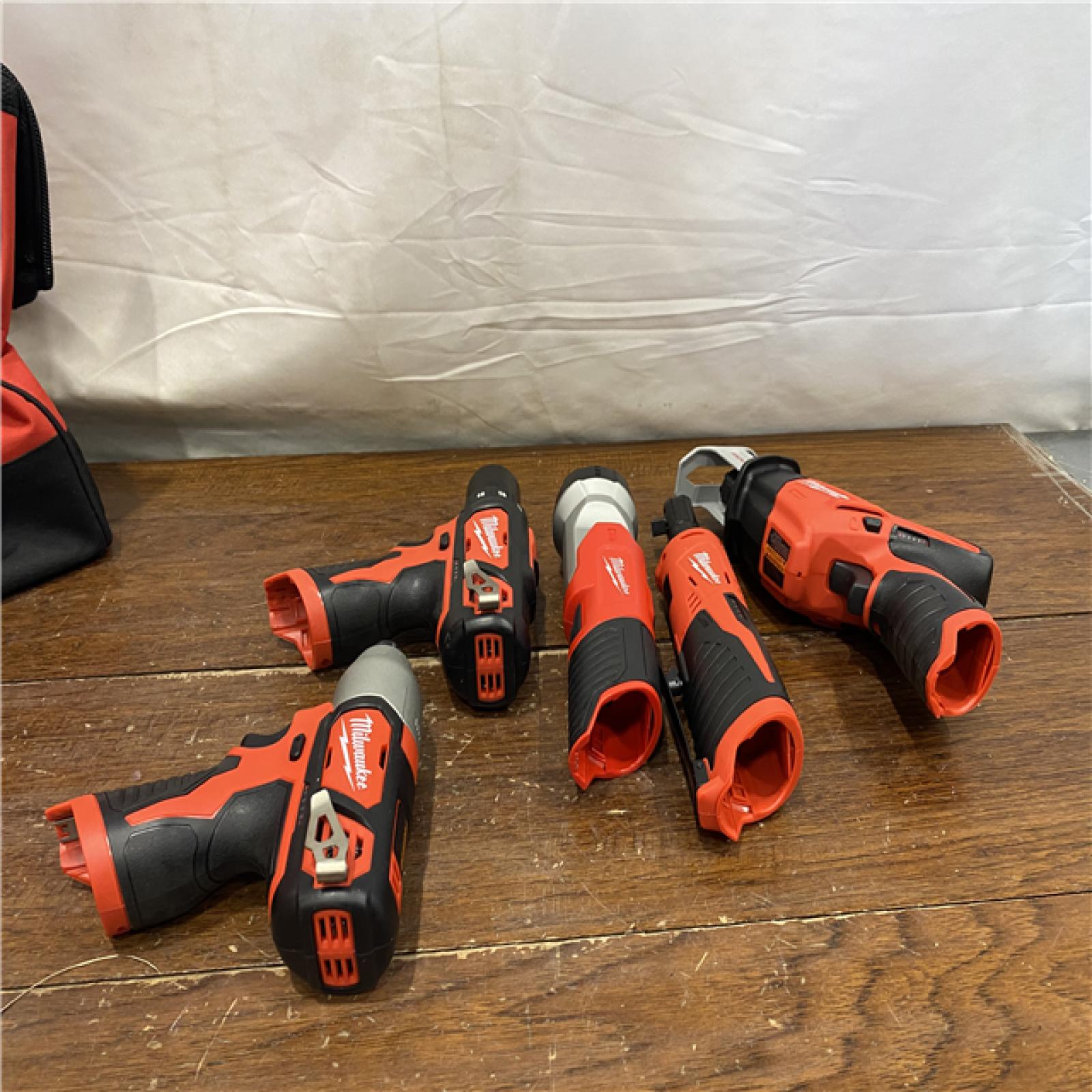 AS-IS MILWAUKEE M12 12V Lithium-Ion Cordless Combo Kit (5-Tool) with Two 1.5Ah Batteries, Charger & Tool Bag