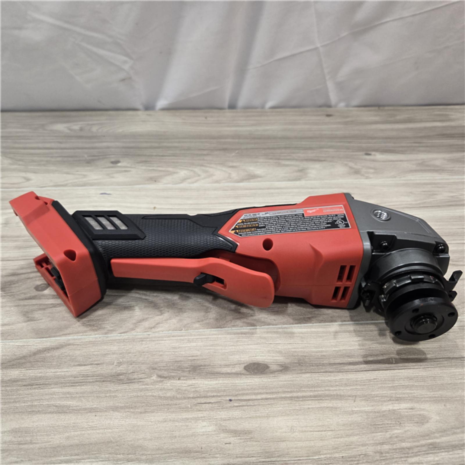 AS-IS Milwaukee 2880-20 FUEL 18V Cordless 4-1/2 in./5 in. Grinder  (Tool-Only)