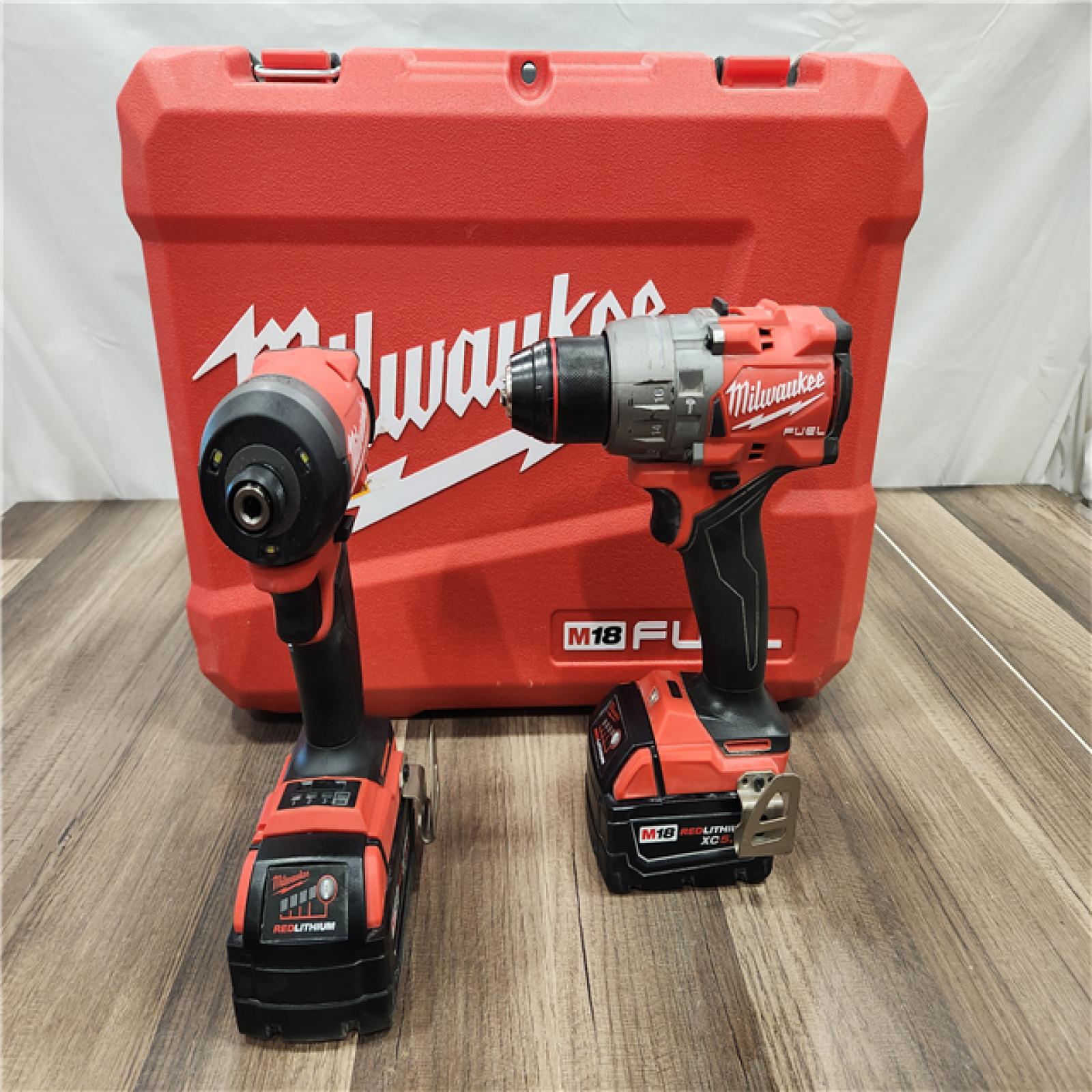 AS-IS  MILWAUKEE FUEL 18V Lithium-Ion Brushless Cordless Hammer Drill and Impact Driver Combo Kit (2-Tool) with 2 Batteries
