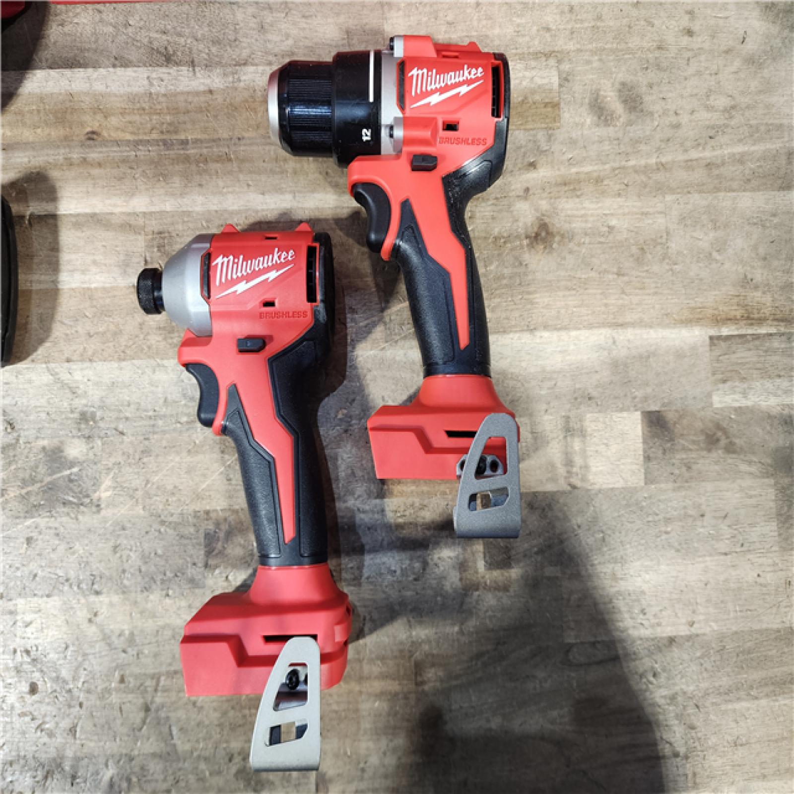 HOUSTON LOCATION - AS-IS Milwaukee M18 18V Lithium-Ion Brushless Cordless Compact Drill/Impact Combo Kit (2-Tool) W/(2) 2.0 Ah Batteries  Charger & Bag