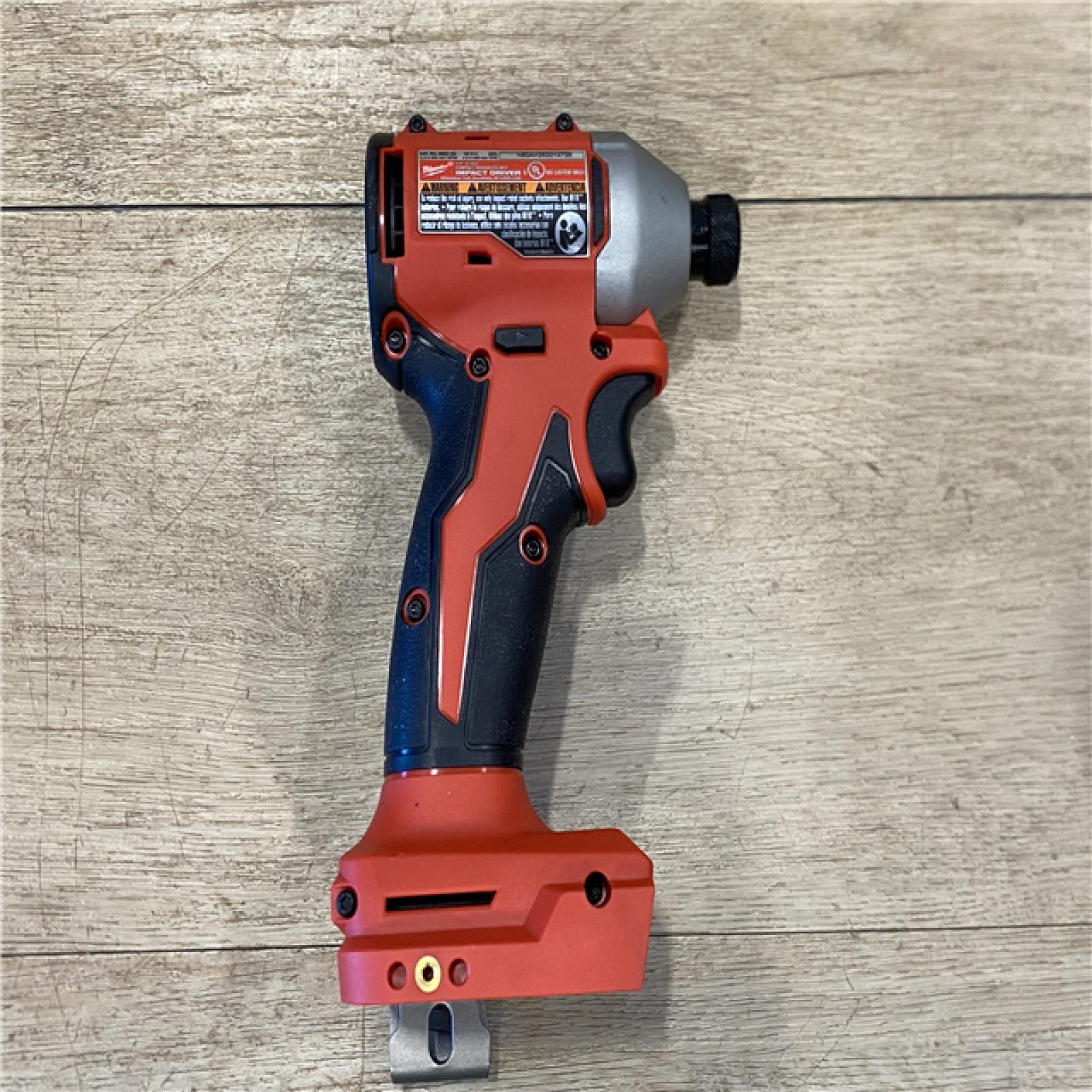 AS-IS Milwaukee  M18 18-Volt Lithium-Ion Brushless Cordless 1/4 in. Compact Impact Driver with M18 5.0Ah Battery and Charger