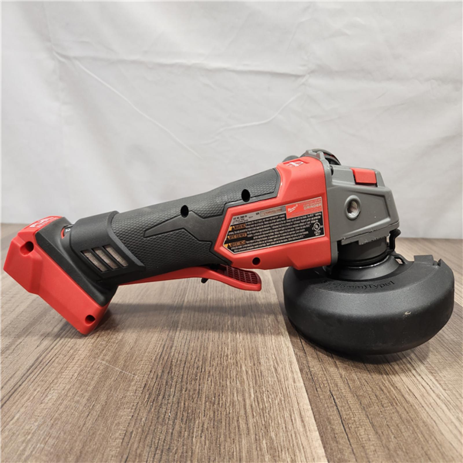 AS-IS- Milwaukee M18 FUEL 18V Lithium-Ion Brushless Cordless 4-1/2 in./5 in. Grinder with Variable Speed & Paddle Switch (Tool-Only)